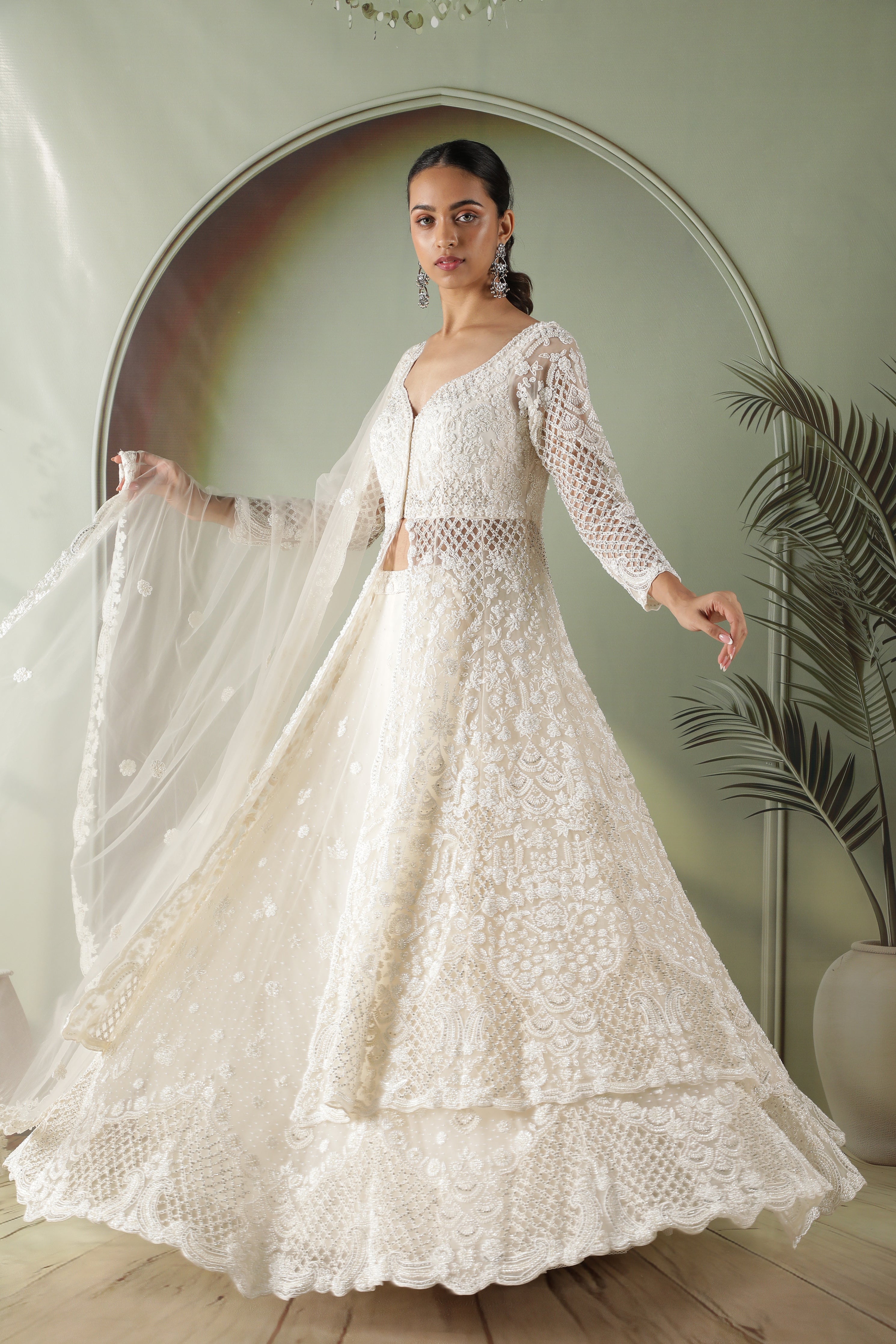 Radiant Pearl Cutwork Net Jacket Lehenga Set
