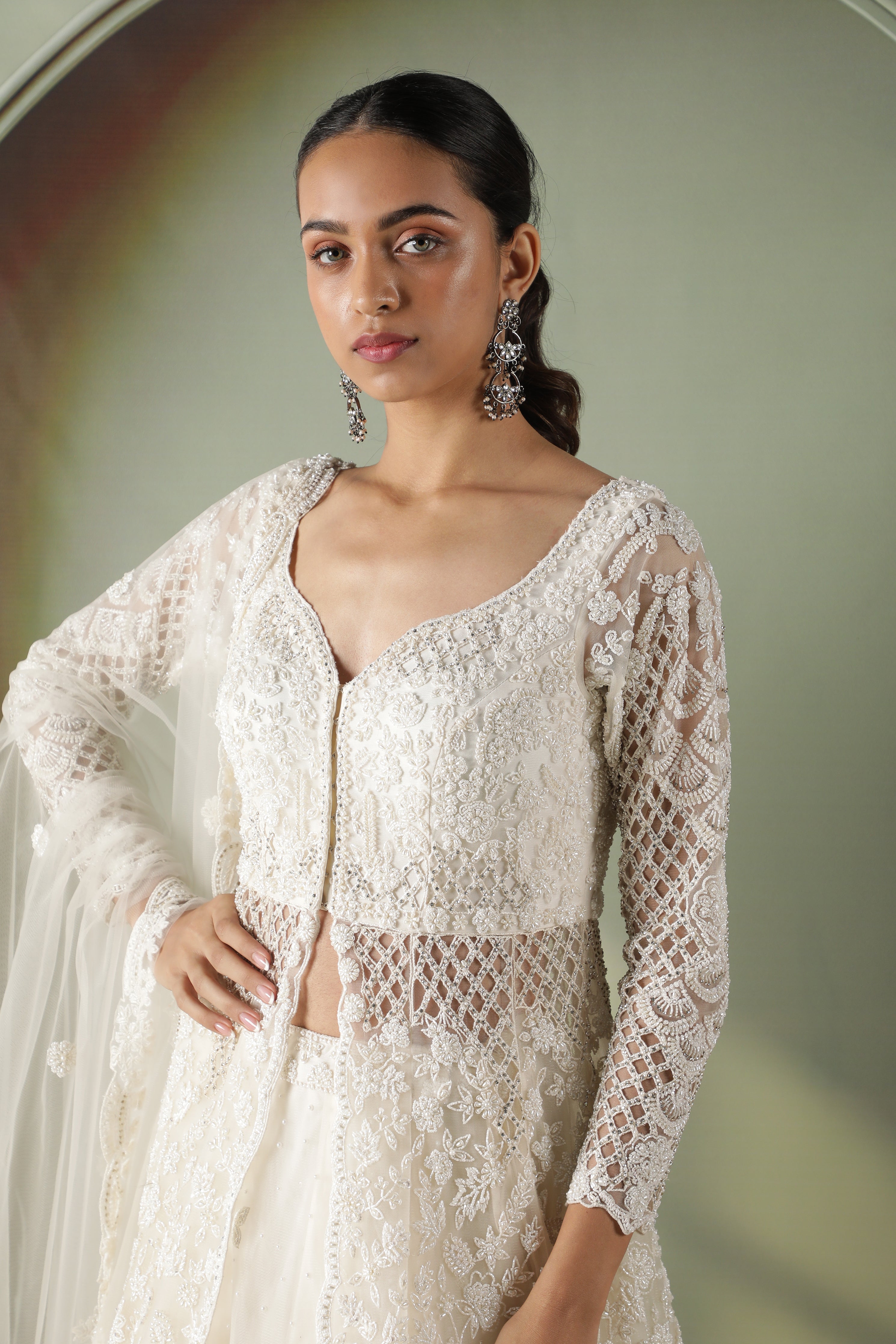 Radiant Pearl Cutwork Net Jacket Lehenga Set