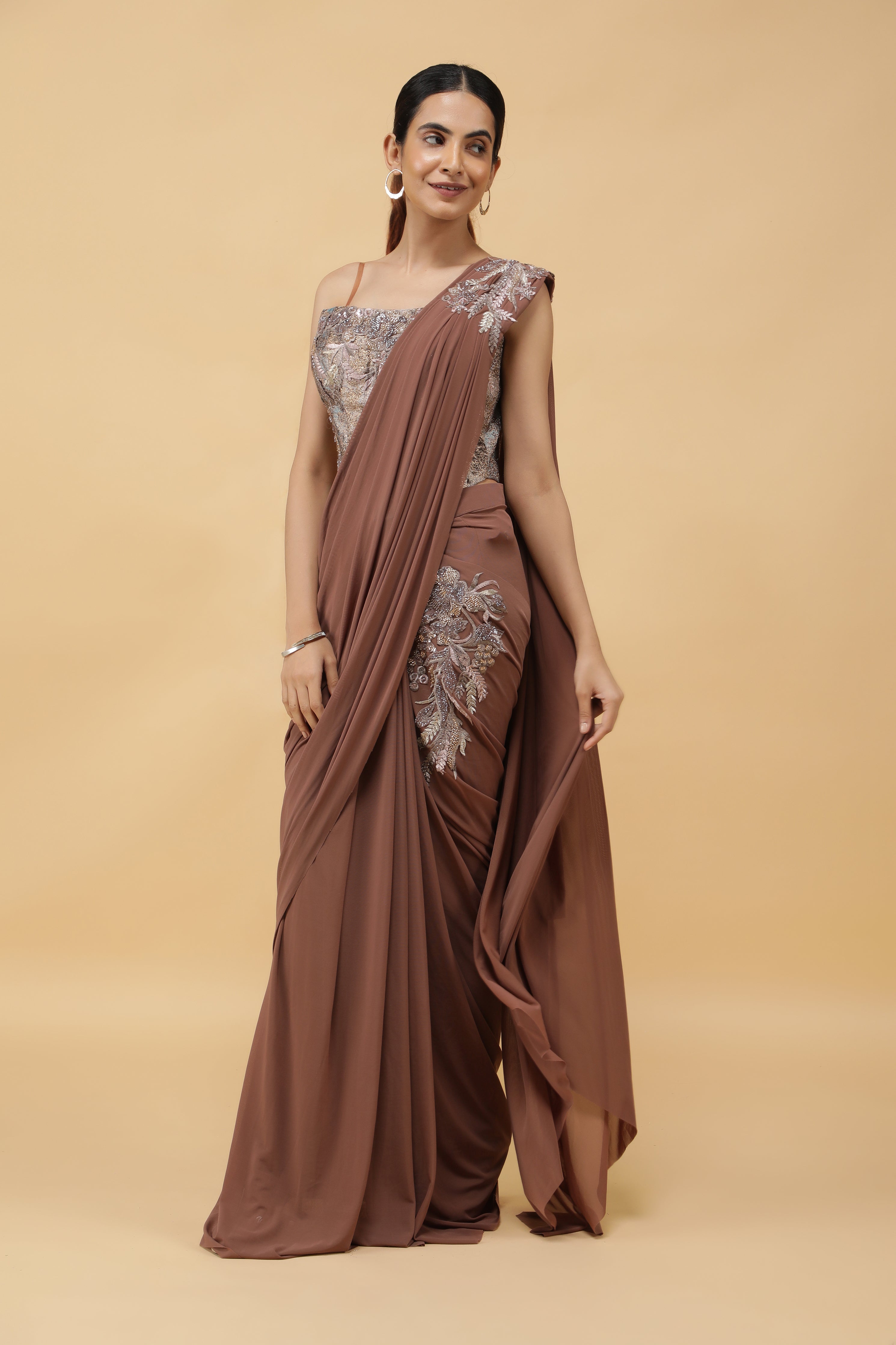 Mocha Lycra Net Drape Saree with Pastel Embroidered Corset Blouse