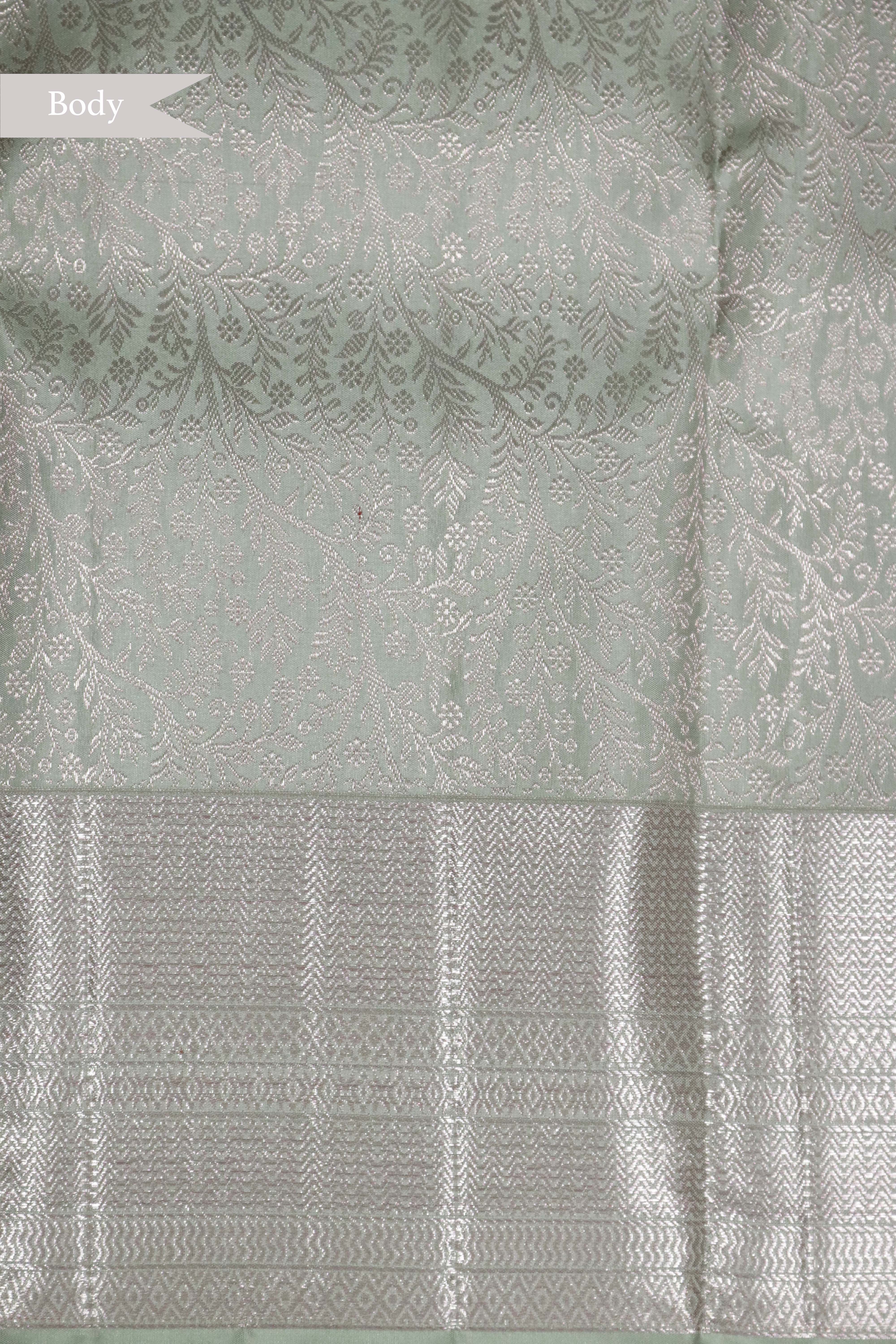 Pastel Green Kanchipuram Silk Saree with Rose Gold Zari