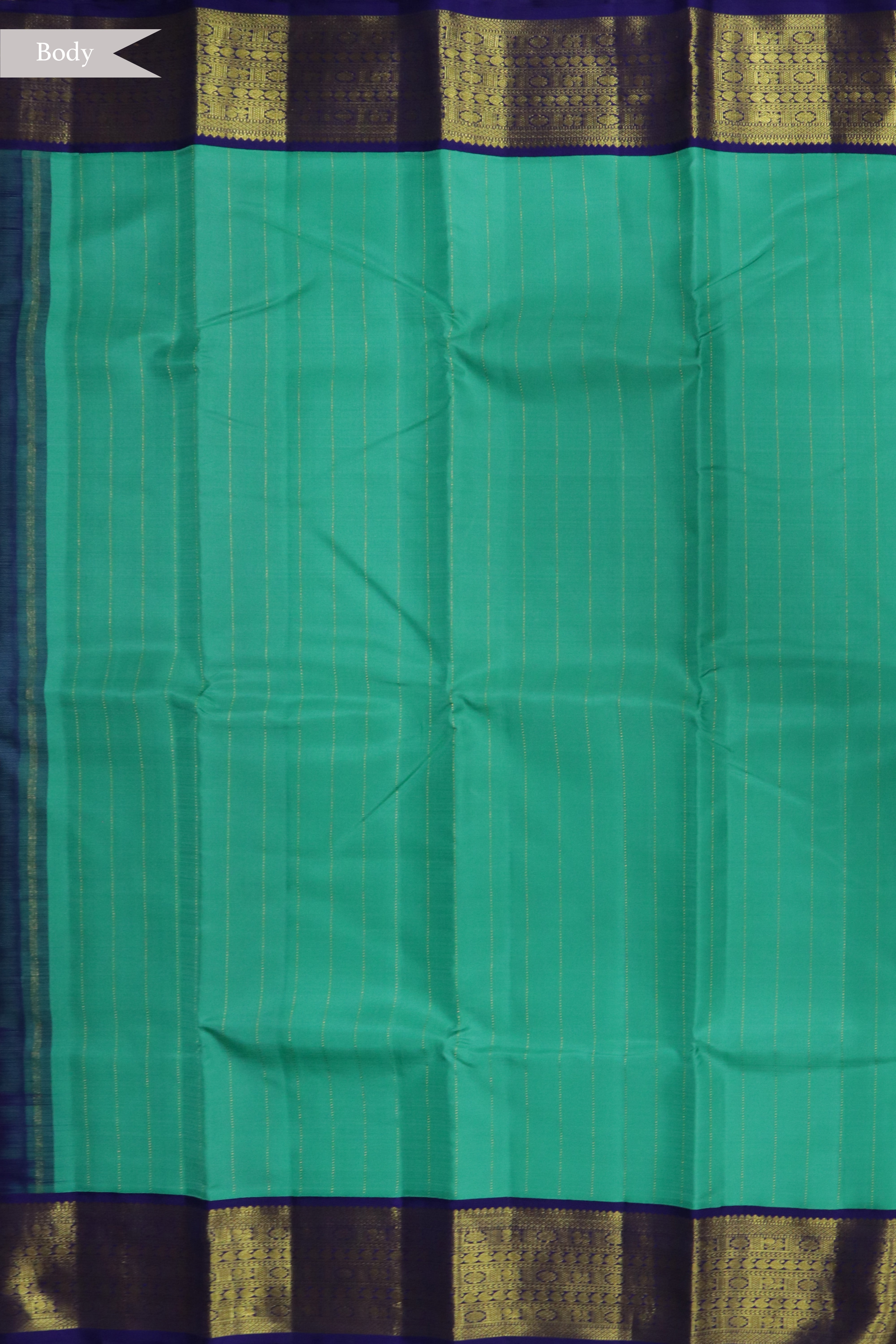 Emerald Green Kanchivaram Silk Saree with Zari Stripes and Contrast Navy Blue Border