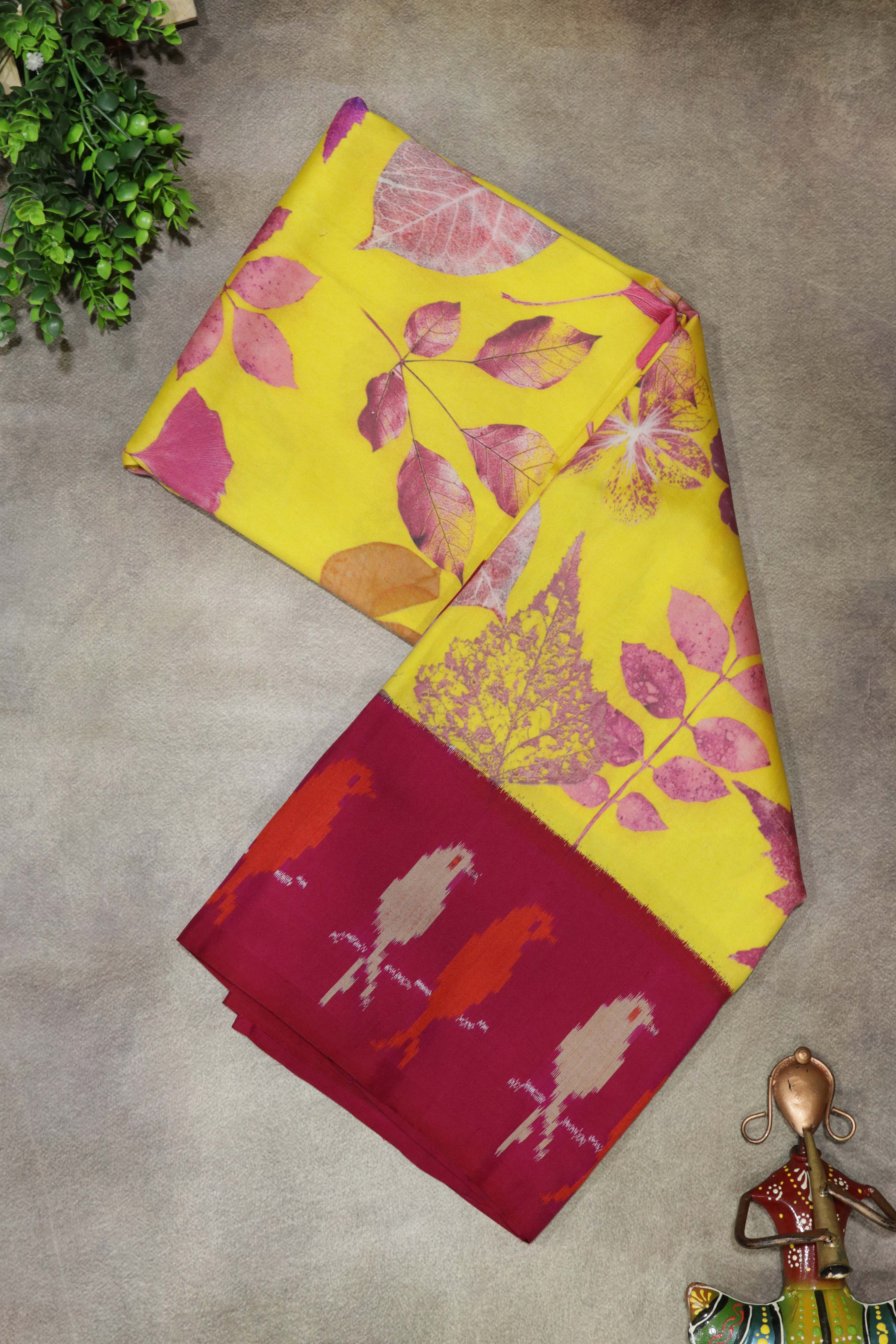Yellow Printed Silk Saree with Ikat Border