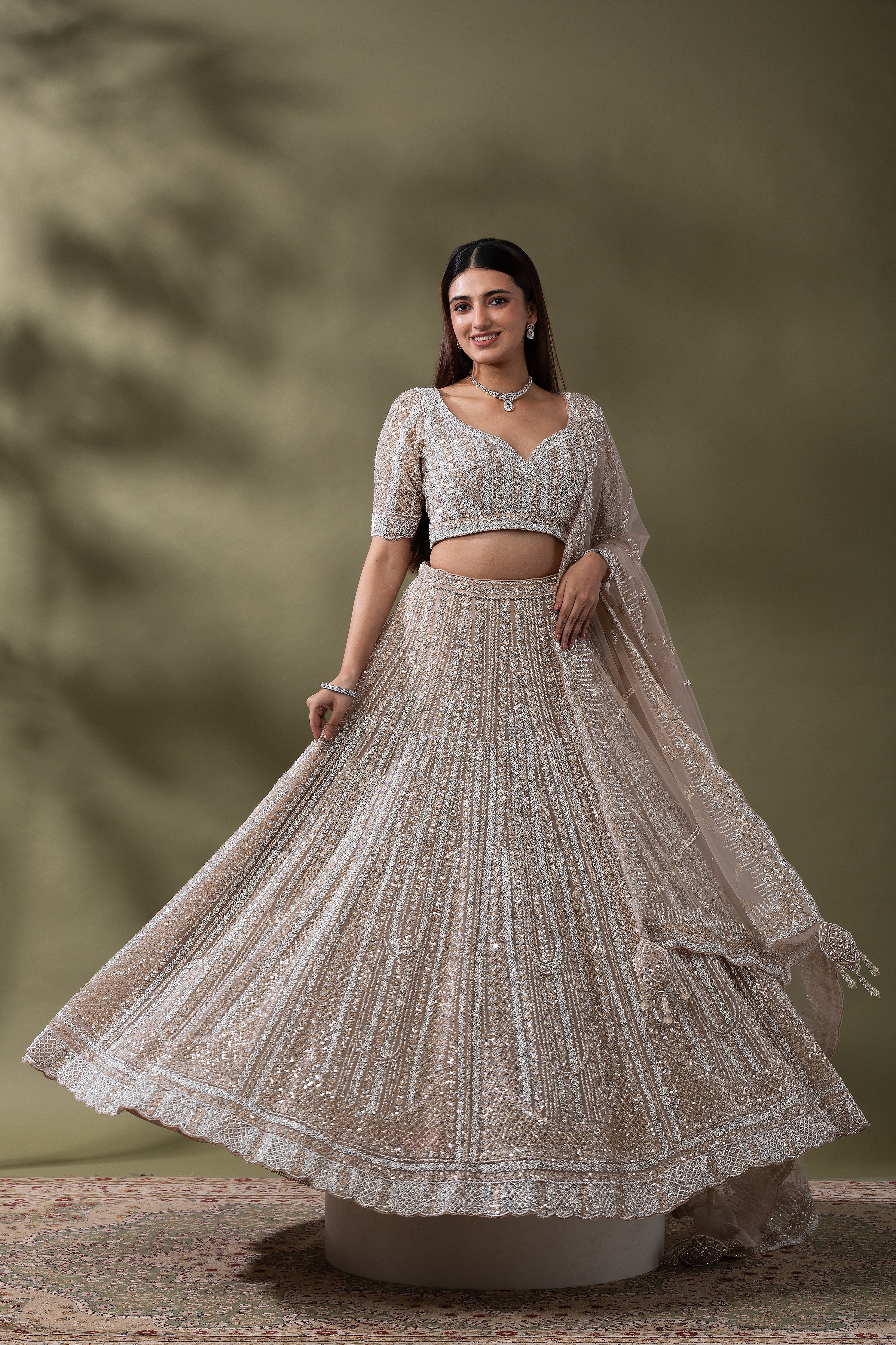 Ivory Sequined Embroidered Lehenga Set  Mokshaa