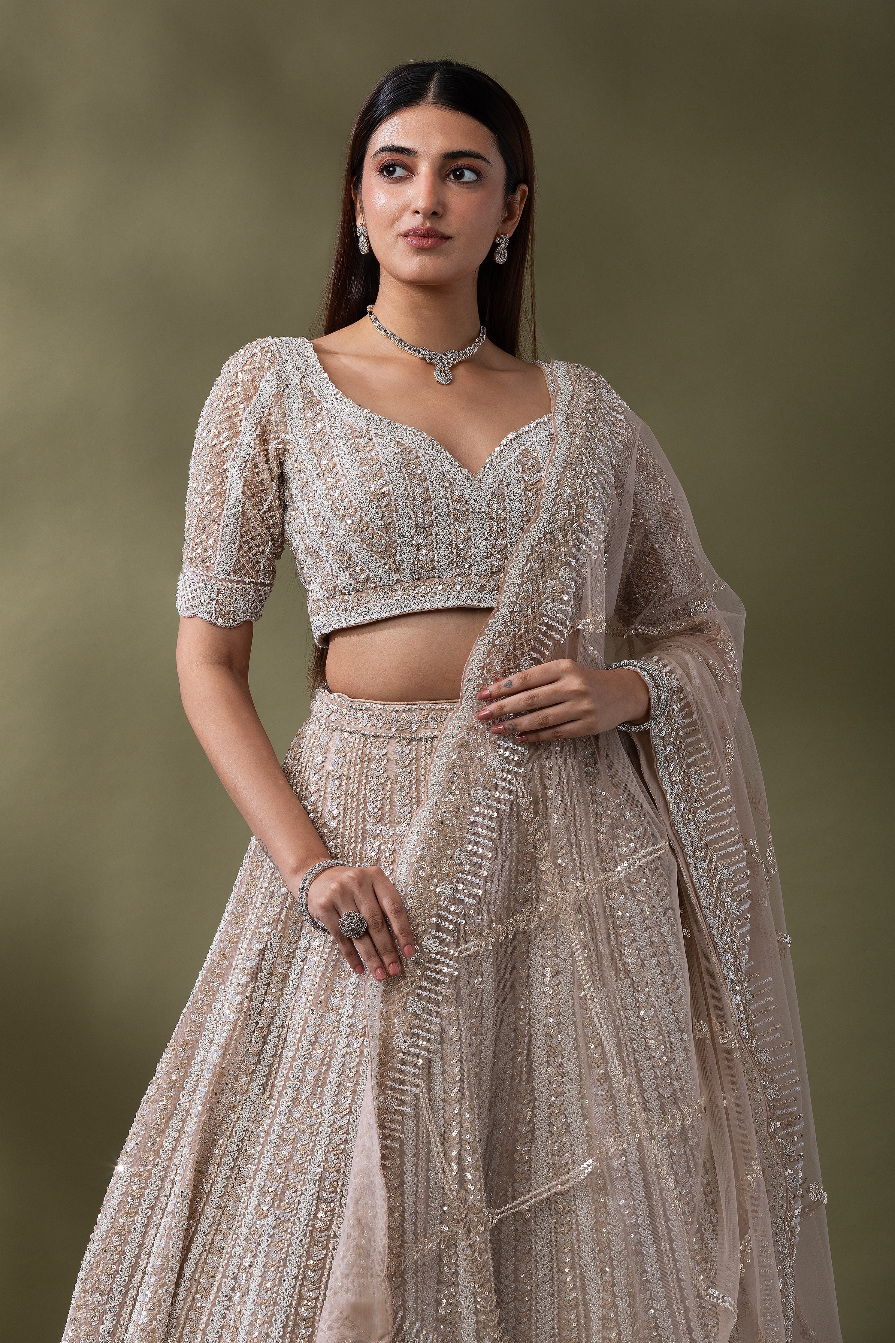 Ivory Sequined Embroidered Lehenga Set  Mokshaa