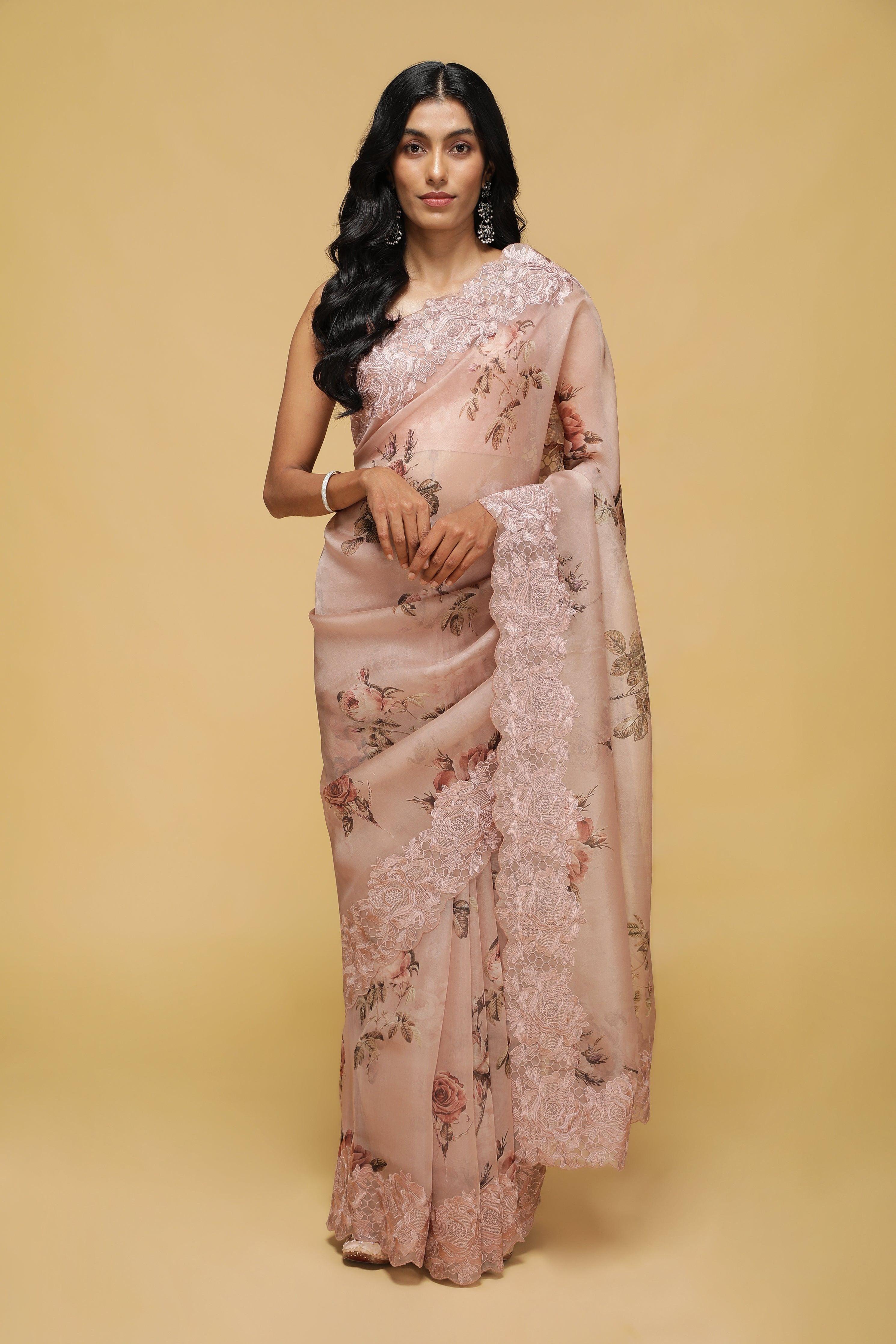 Dusty Peach Organza Saree with Floral Print and Thread Embroidery.