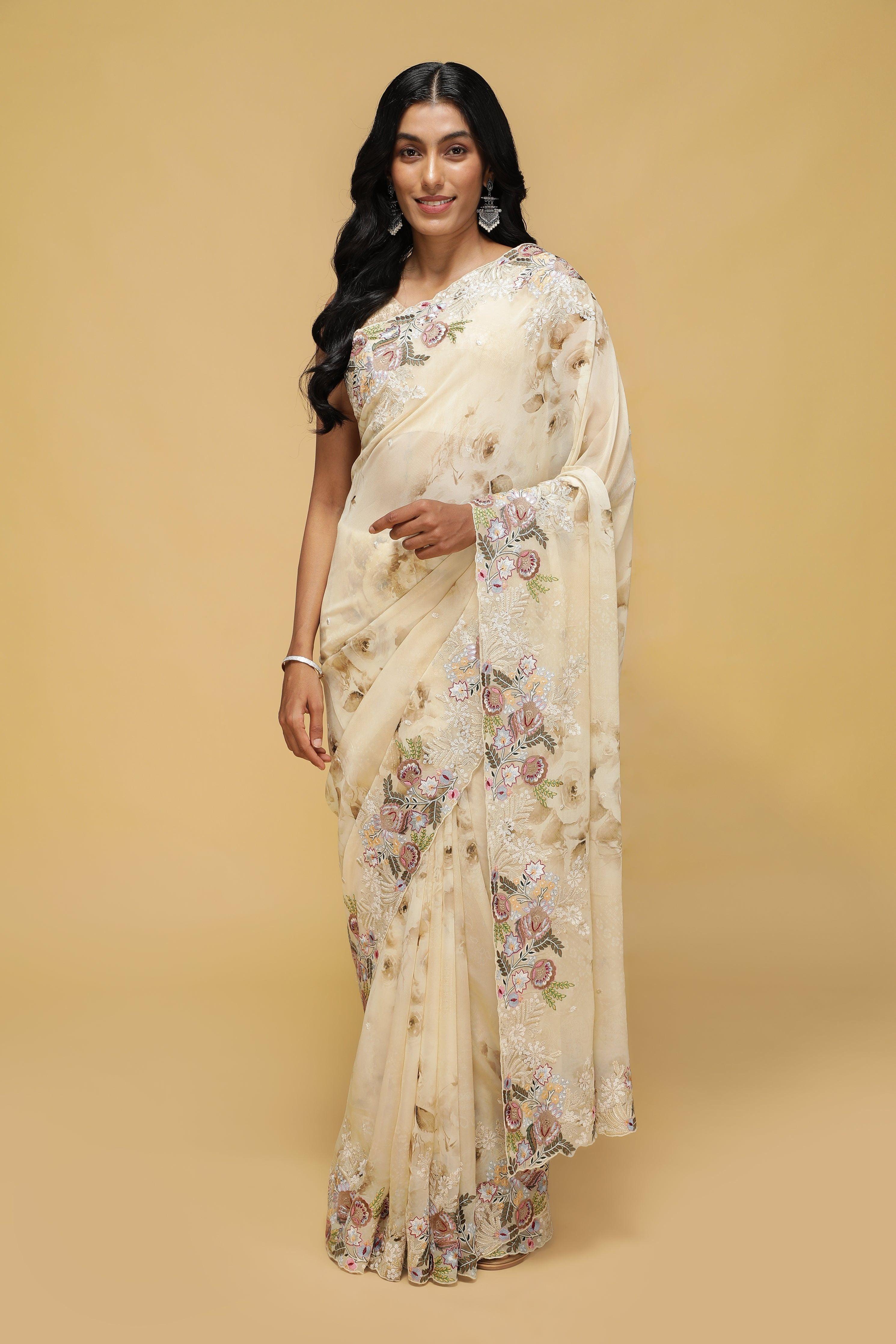 Beige Floral Georgette Saree with Multi-Thread Embroidered Border.