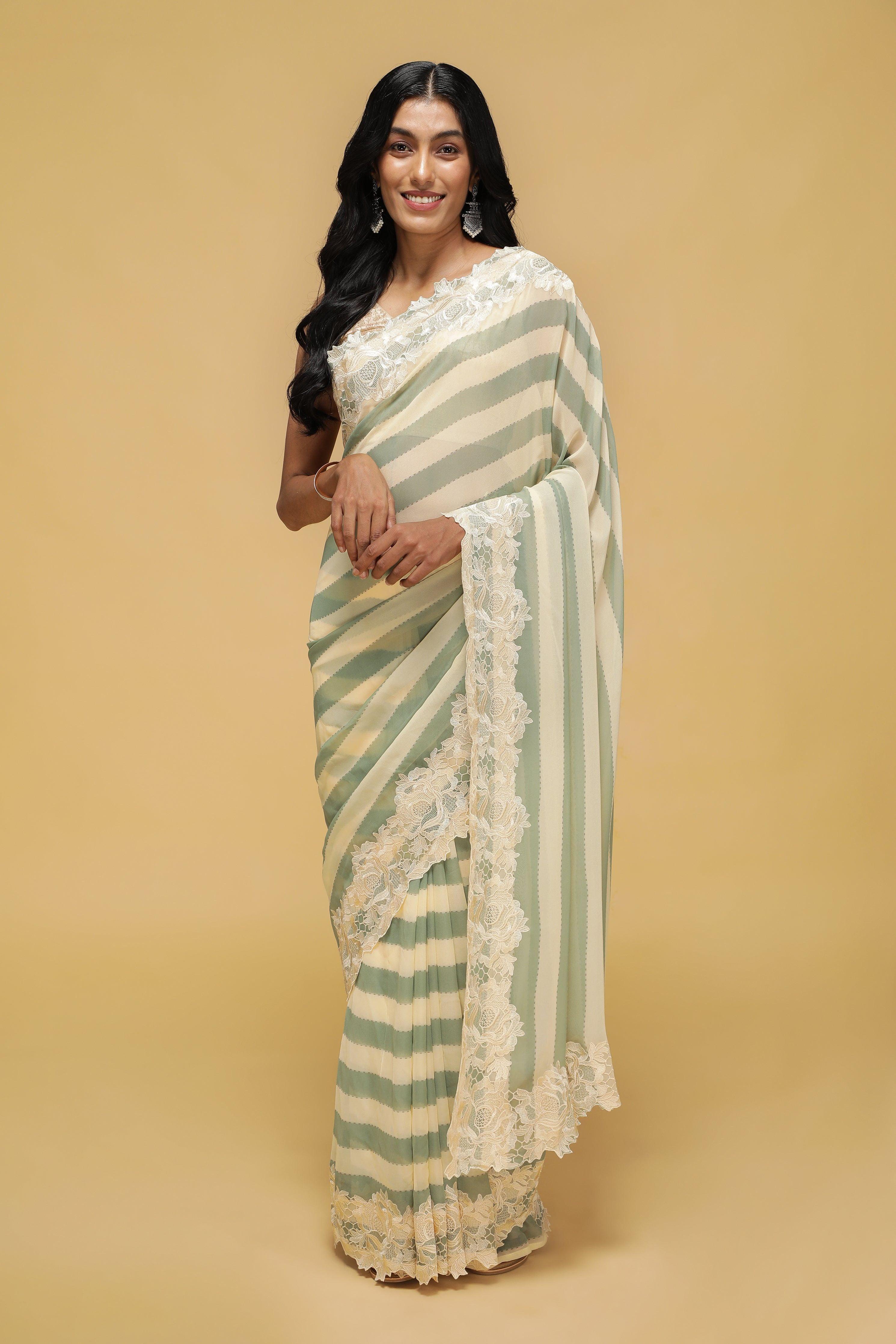 Green & Off-White Striped Georgette Saree with Thread Lace Border.
