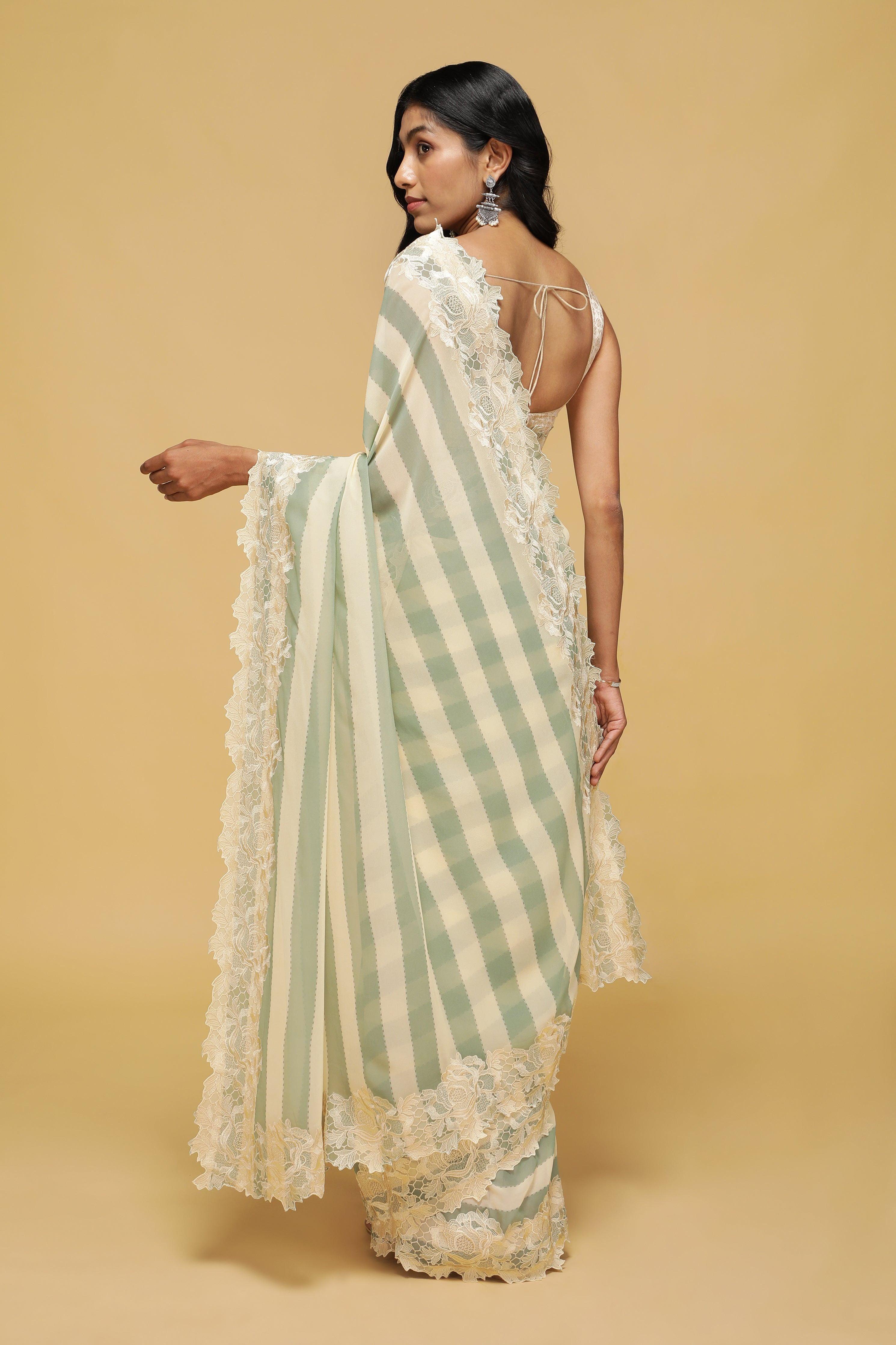 Green & Off-White Striped Georgette Saree with Thread Lace Border.