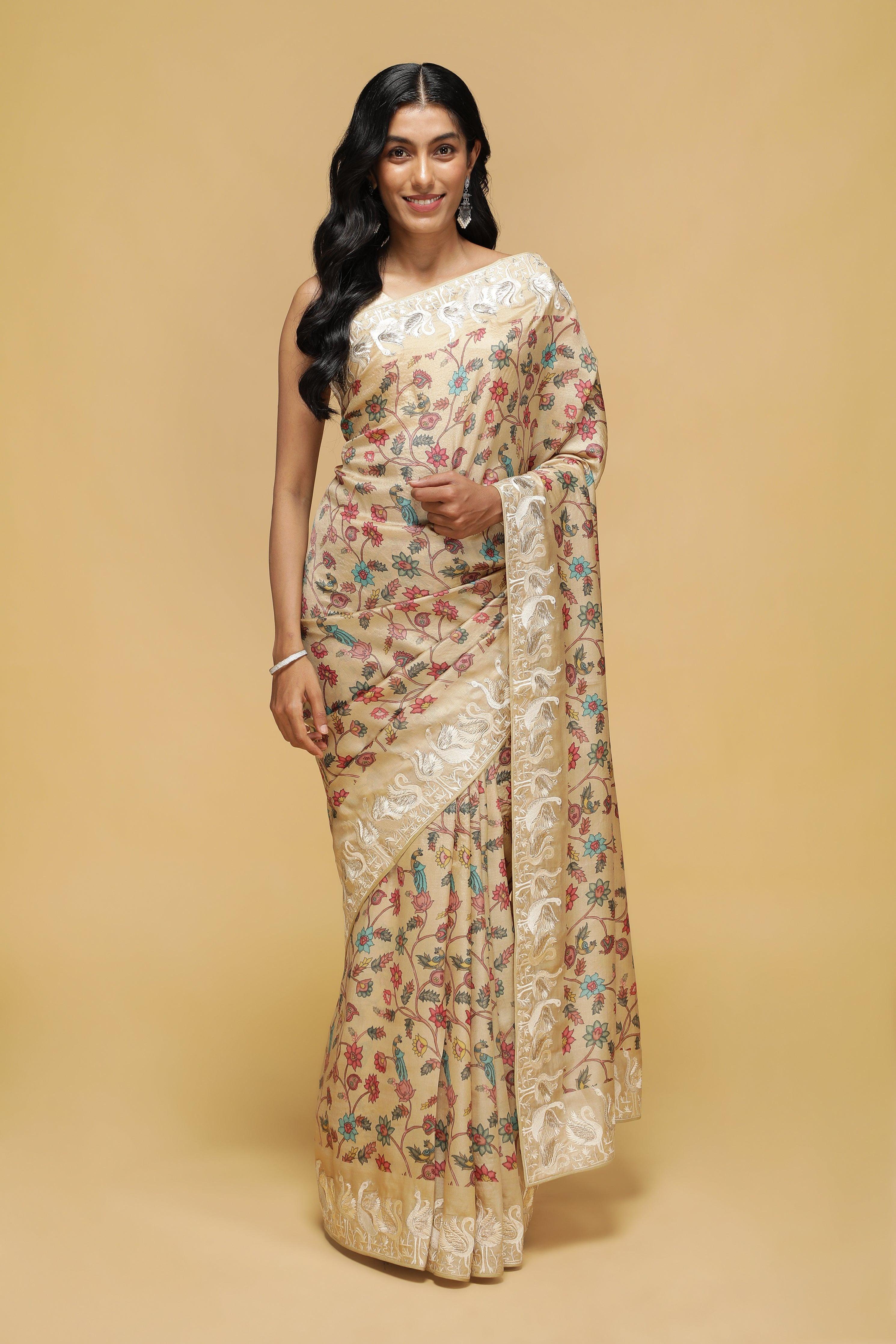Beige Tussar Saree with Kalamkari Print & Swan Zari Border.