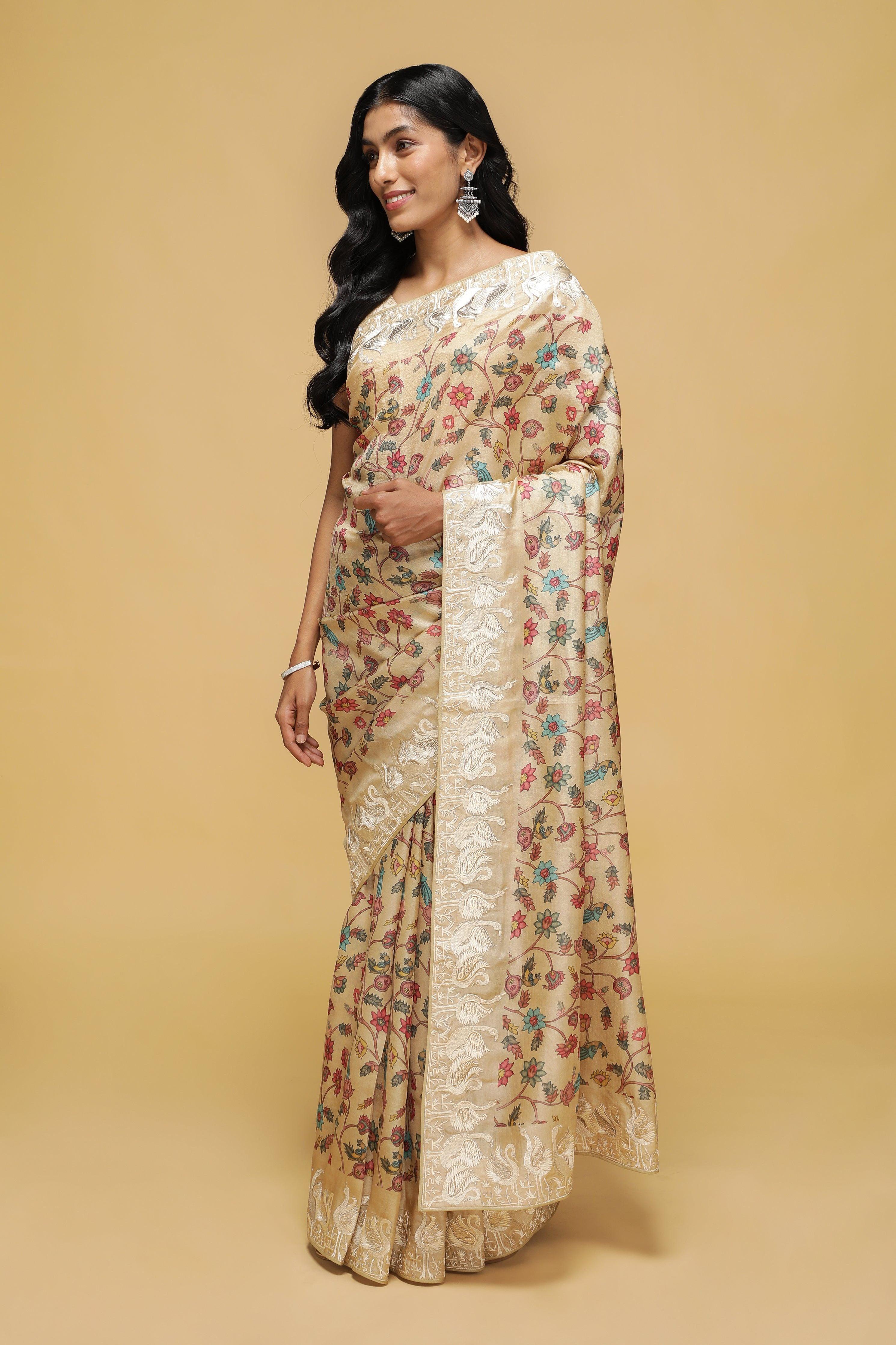 Beige Tussar Saree with Kalamkari Print & Swan Zari Border.