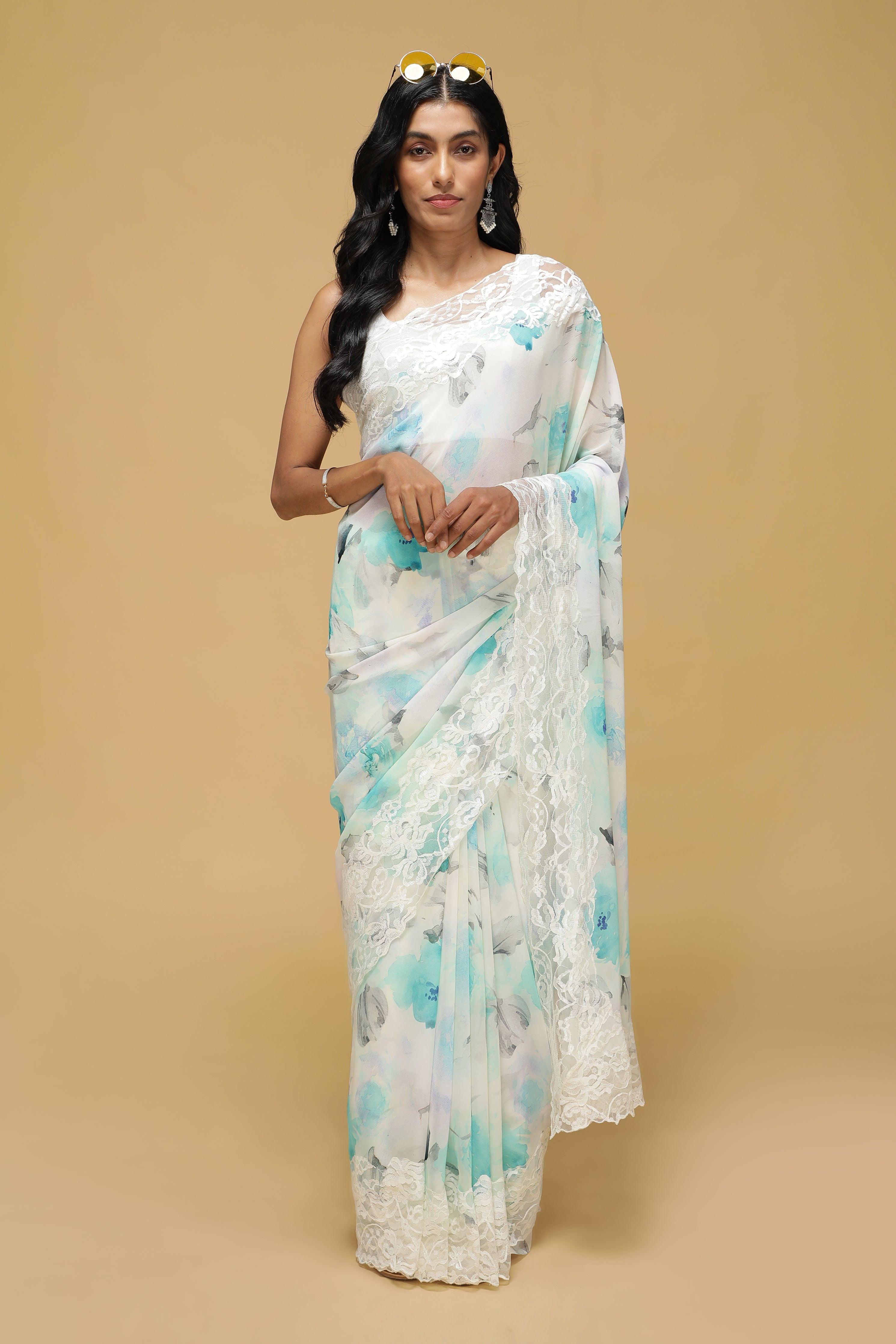 Off-White Floral Georgette Saree with Scalloped Lace Border.