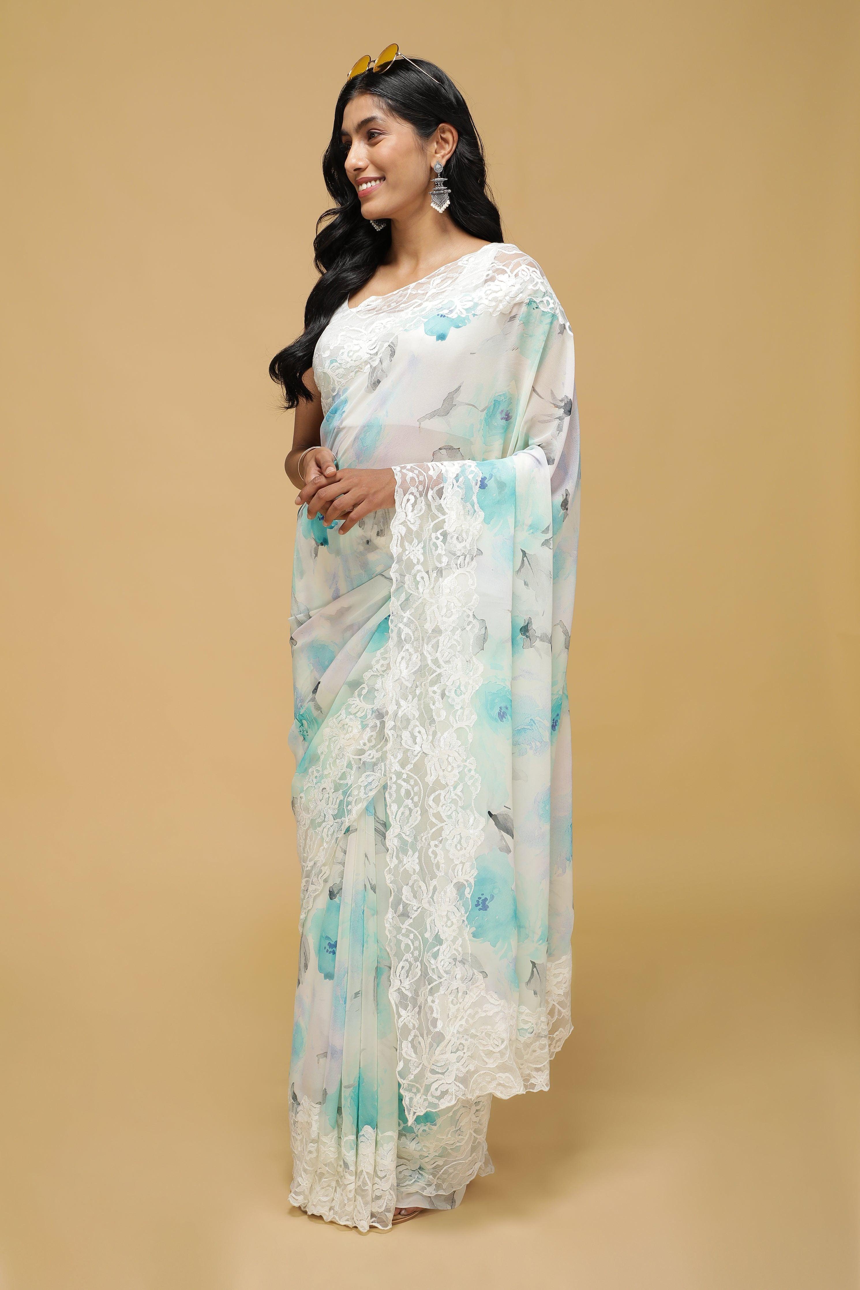 Off-White Floral Georgette Saree with Scalloped Lace Border.
