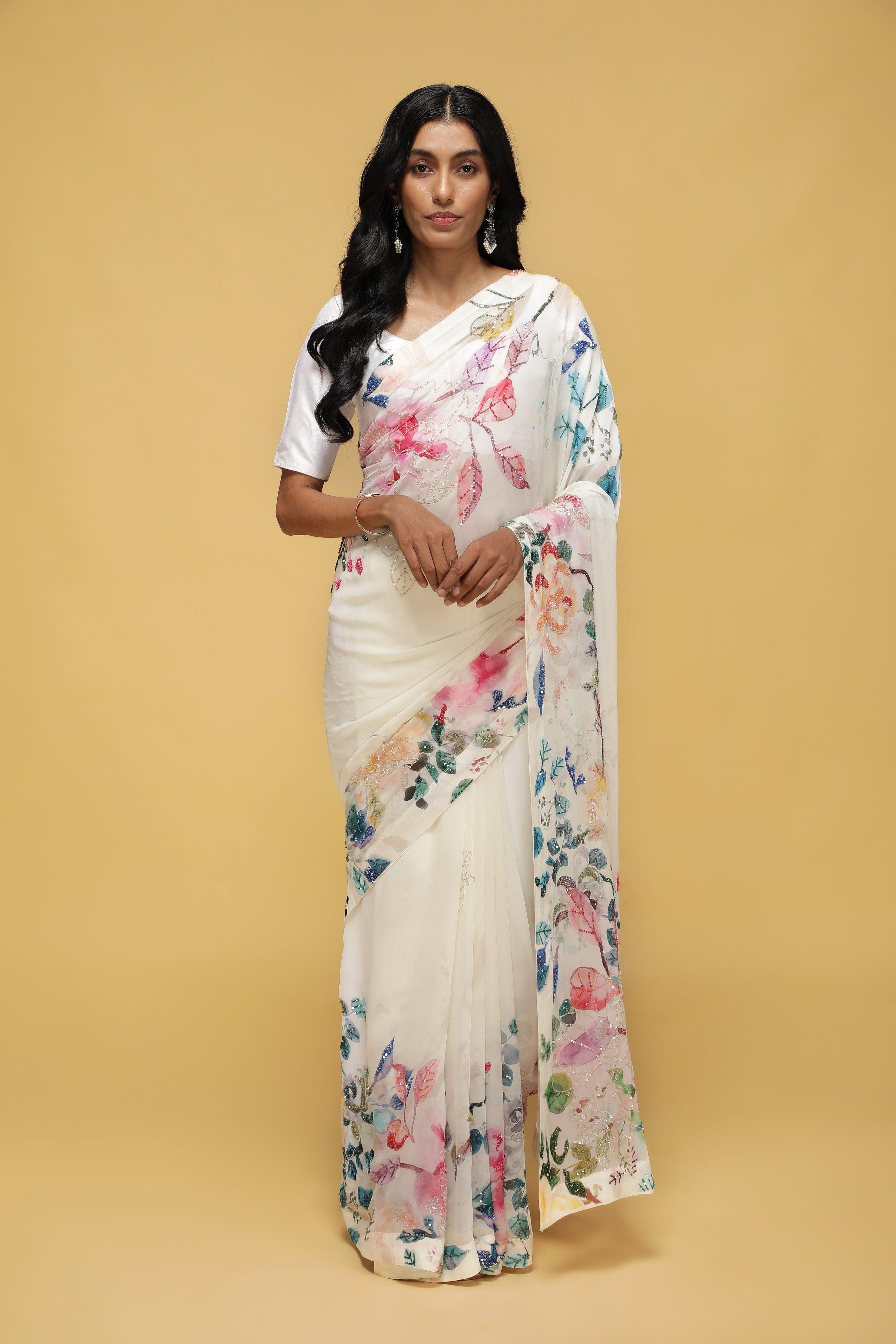 Off-White Georgette Saree with Printed Sequin Border.