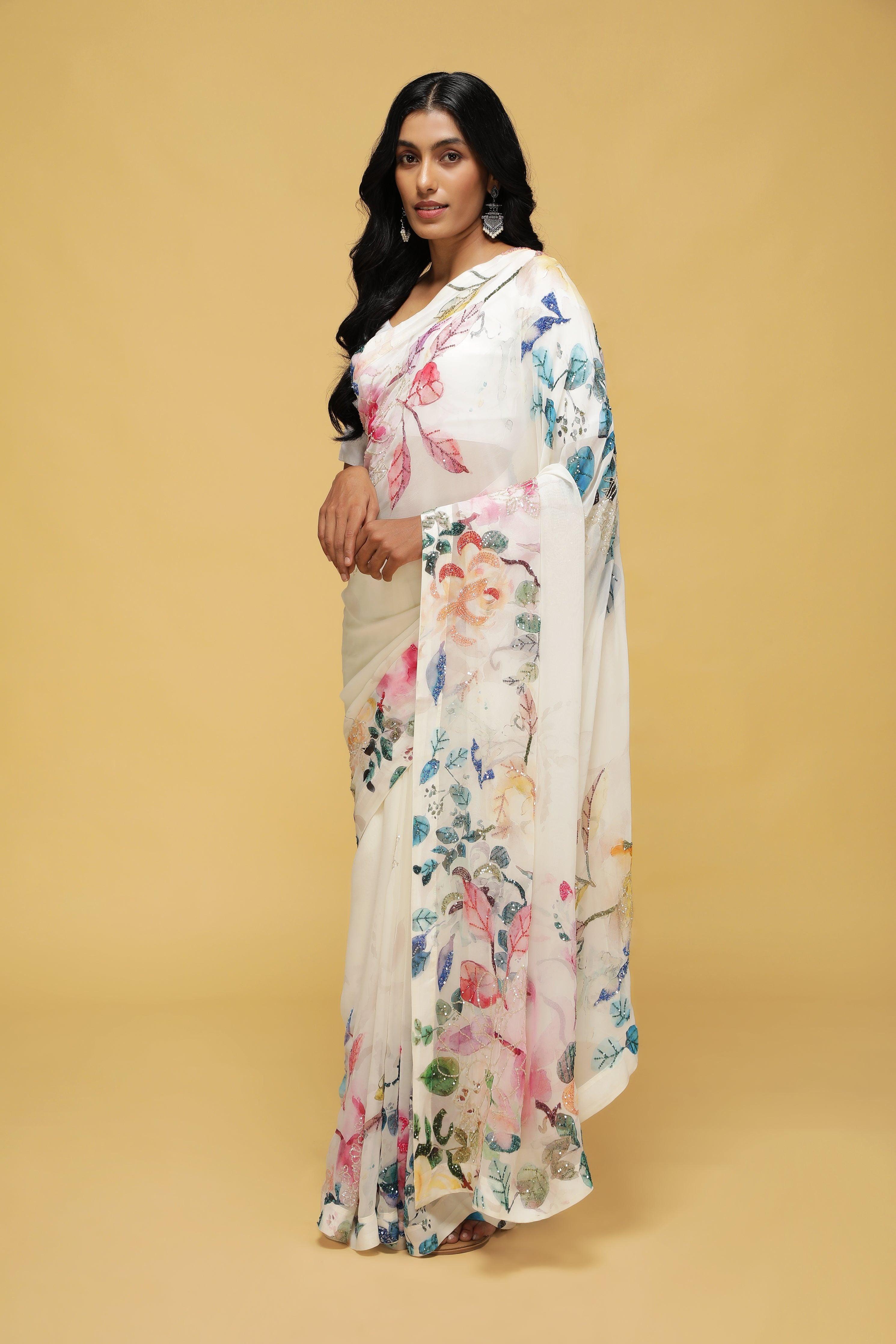 Off-White Georgette Saree with Printed Sequin Border.