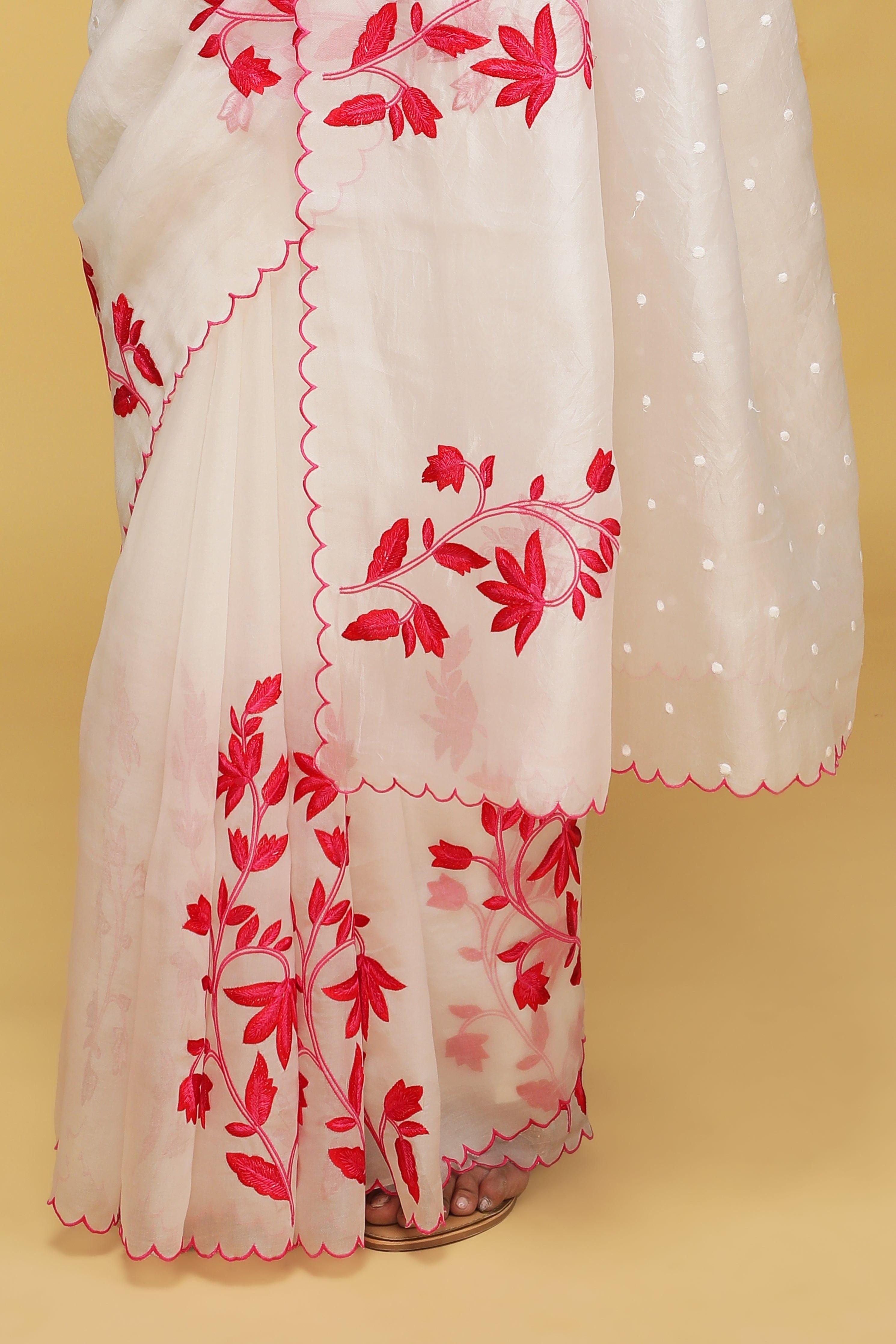 Off White Organza Saree with Pink Thread Embroidery.