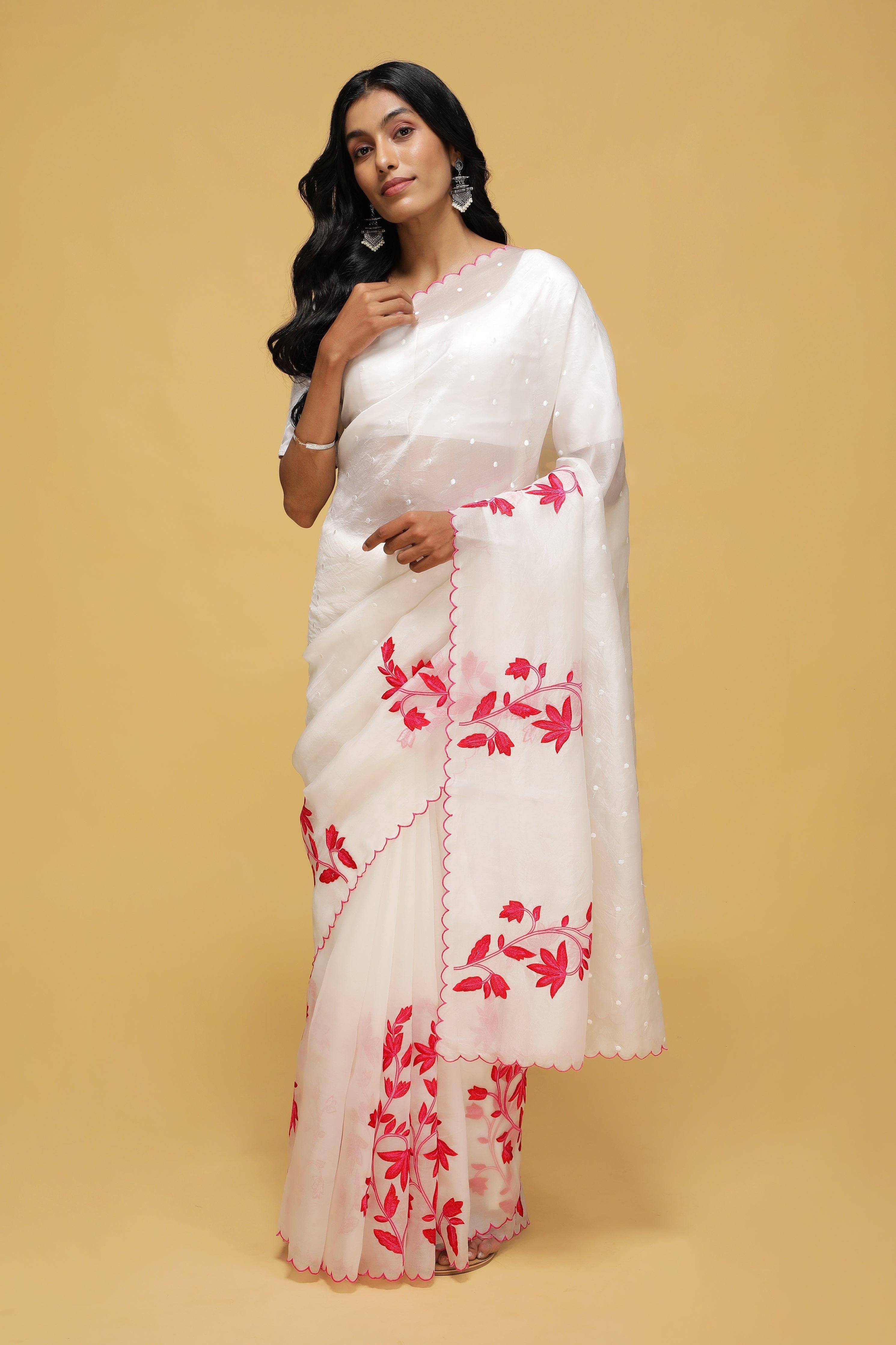 Off White Organza Saree with Pink Thread Embroidery.