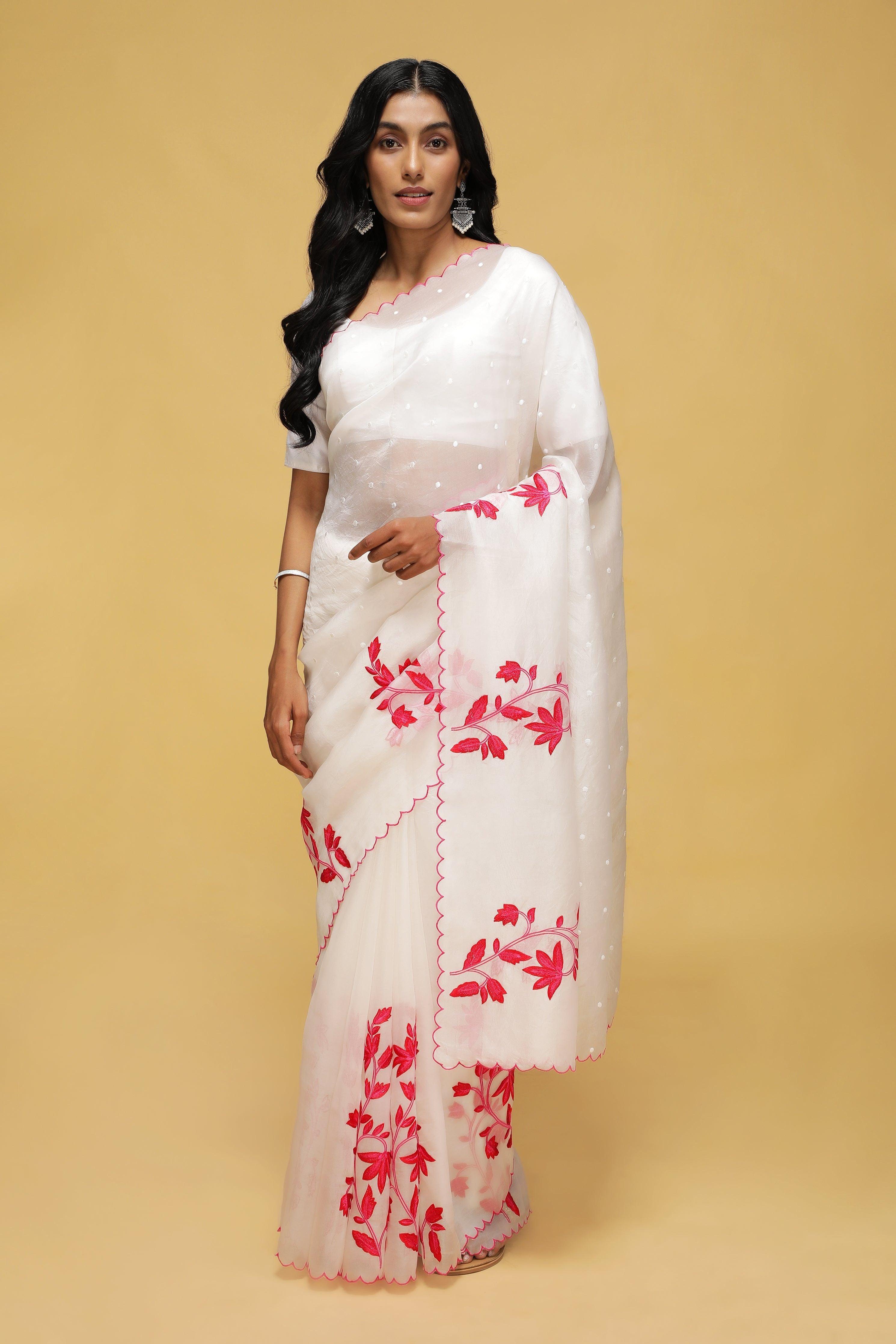 Off White Organza Saree with Pink Thread Embroidery.