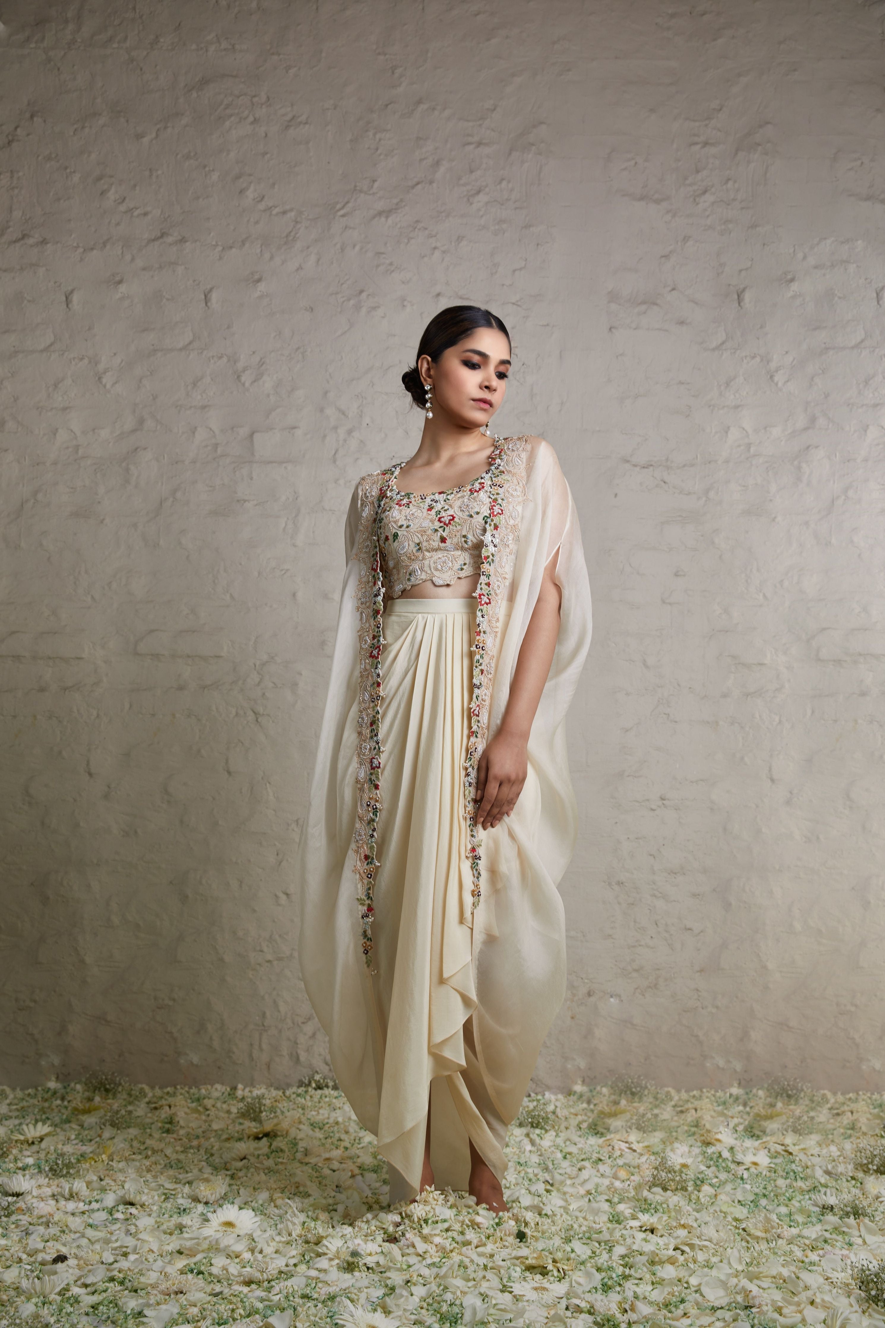 Ivory silk blouse with crepe dhoti and organza cape  Mokshaa