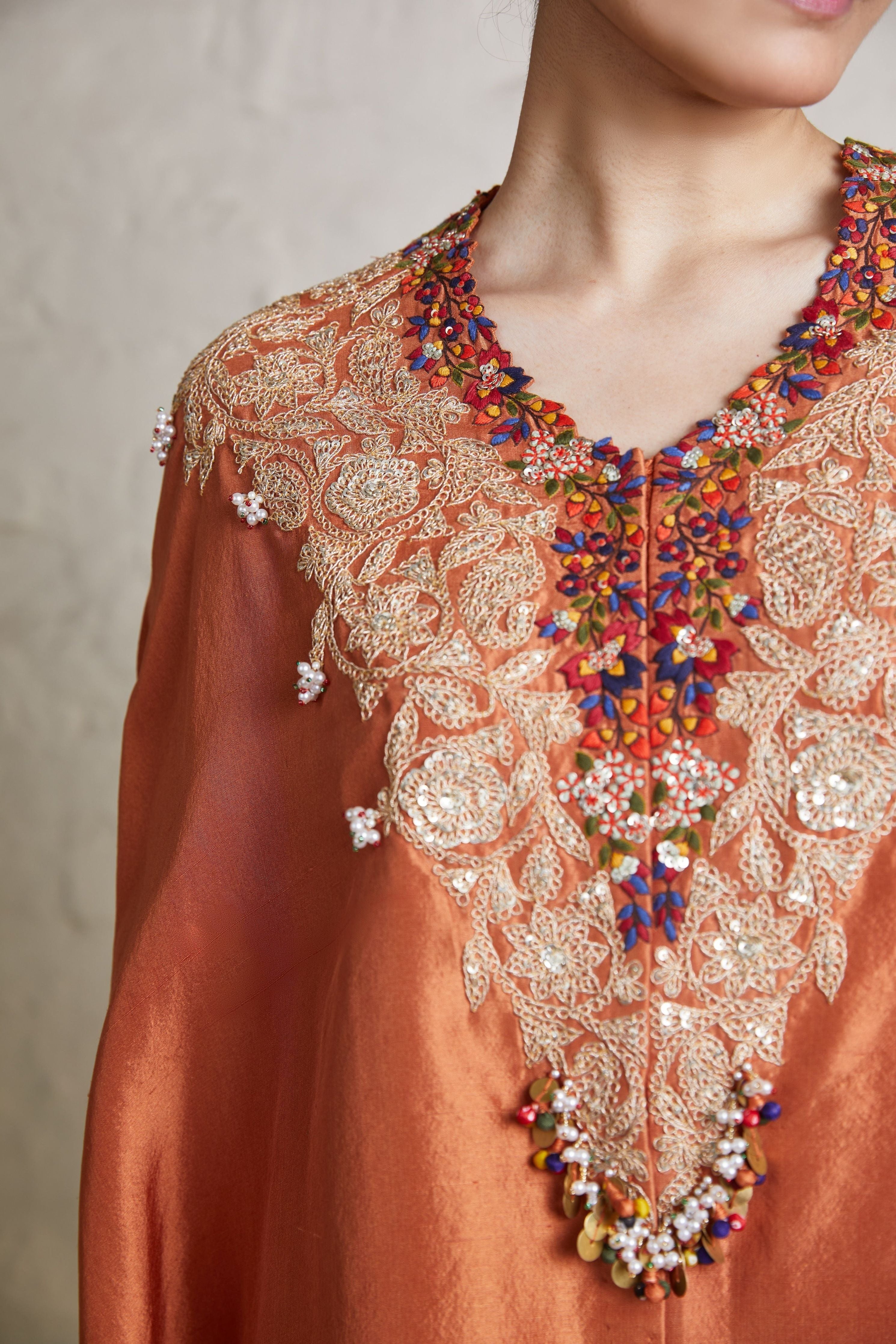 Burnt orange silk kaftaan with crepe dhoti聽 Mokshaa