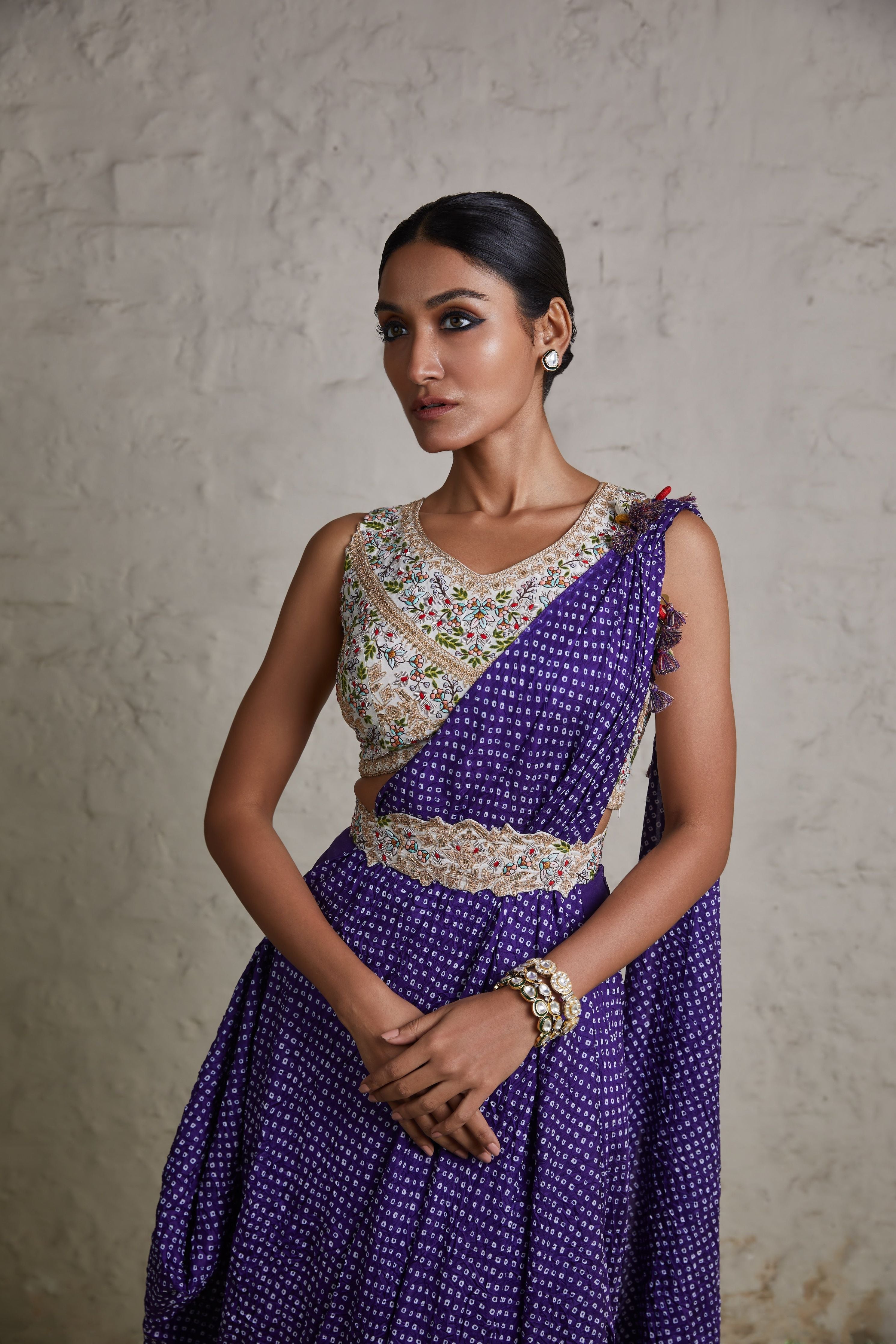 Aubergine silk blouse with bandhej skirt and drape  Mokshaa