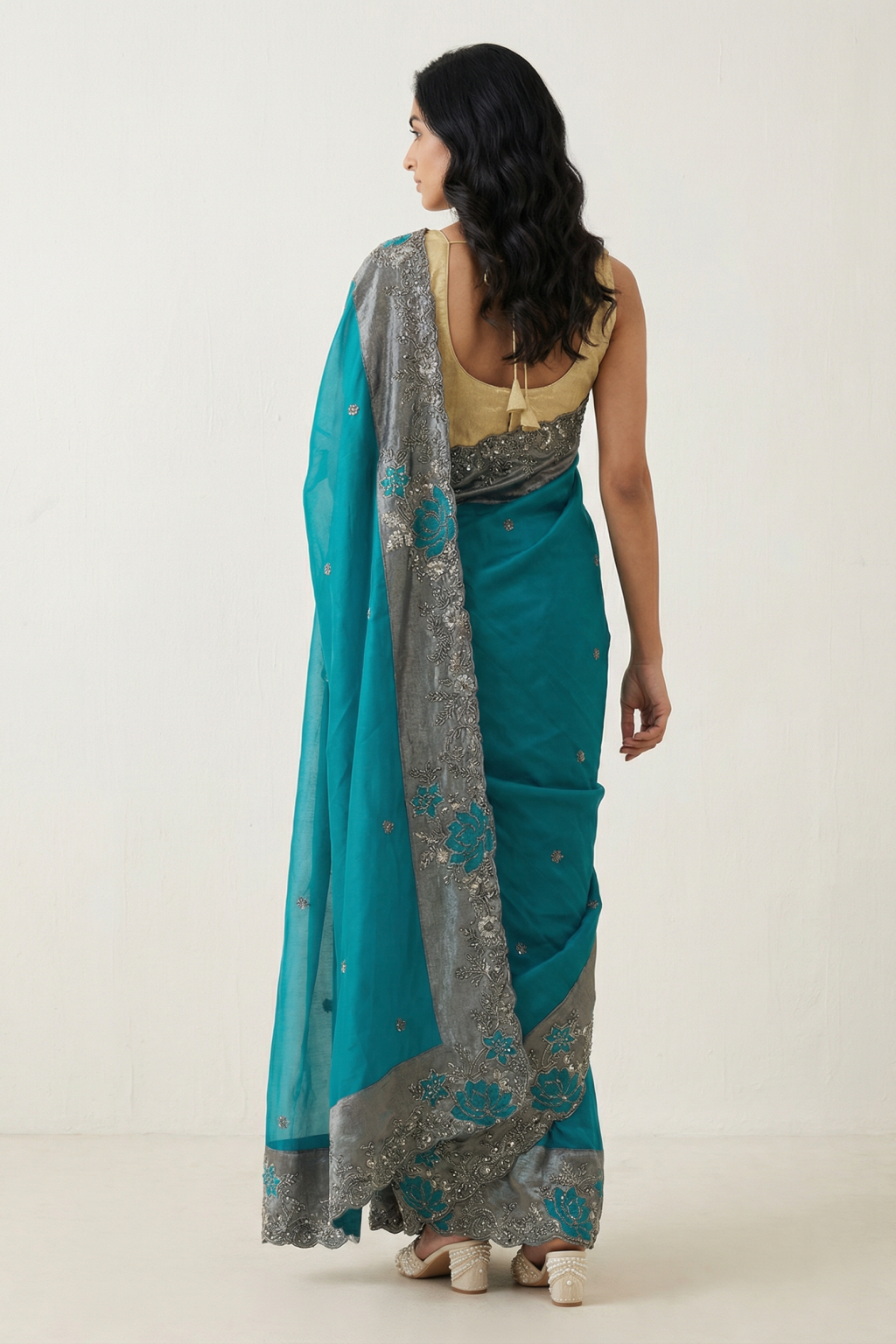Emerald Green Organza Saree with Antique Sequins & Beaded Tissue Border