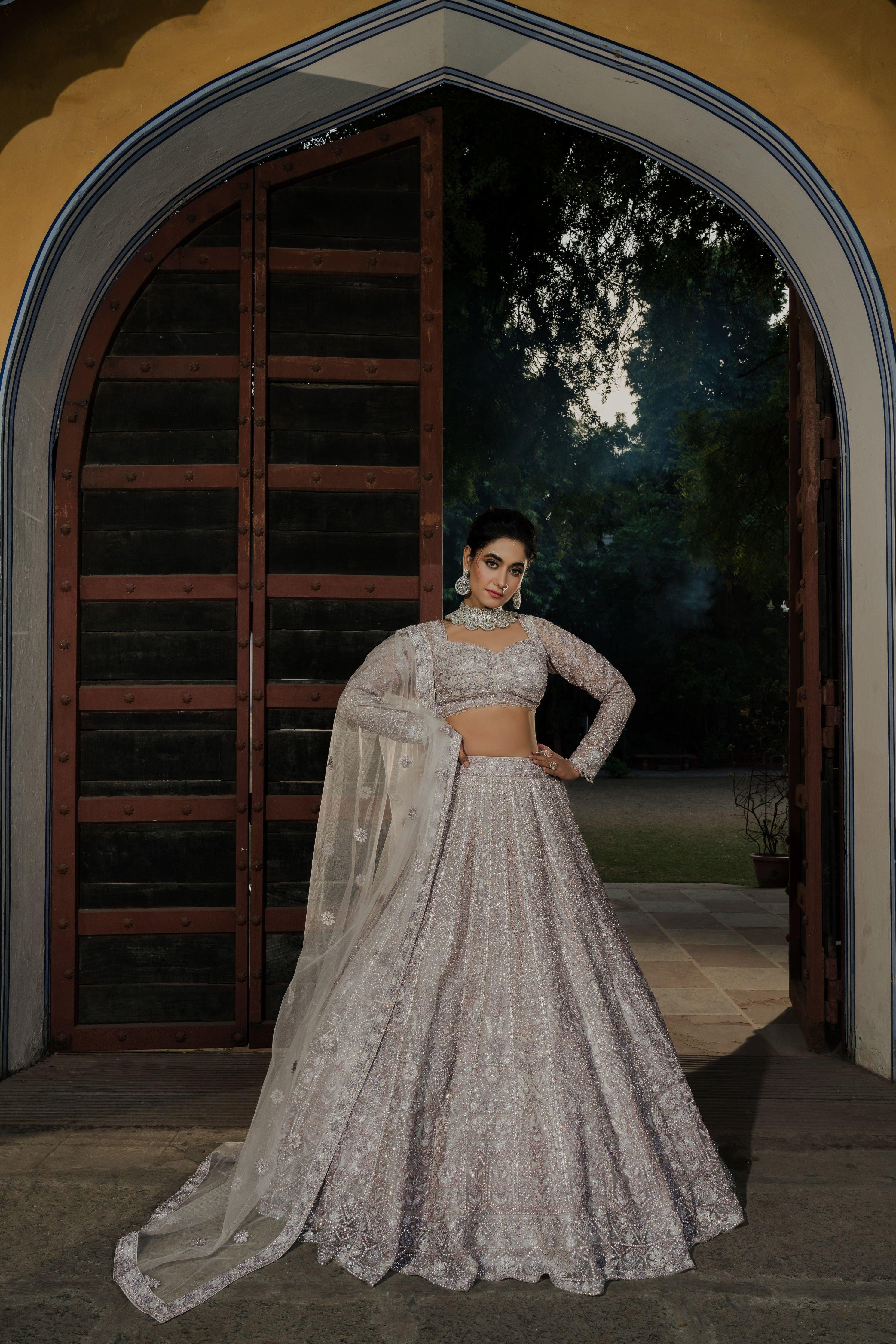Pastel Grey Net Lehenga with Intricate Sequin Work  Mokshaa