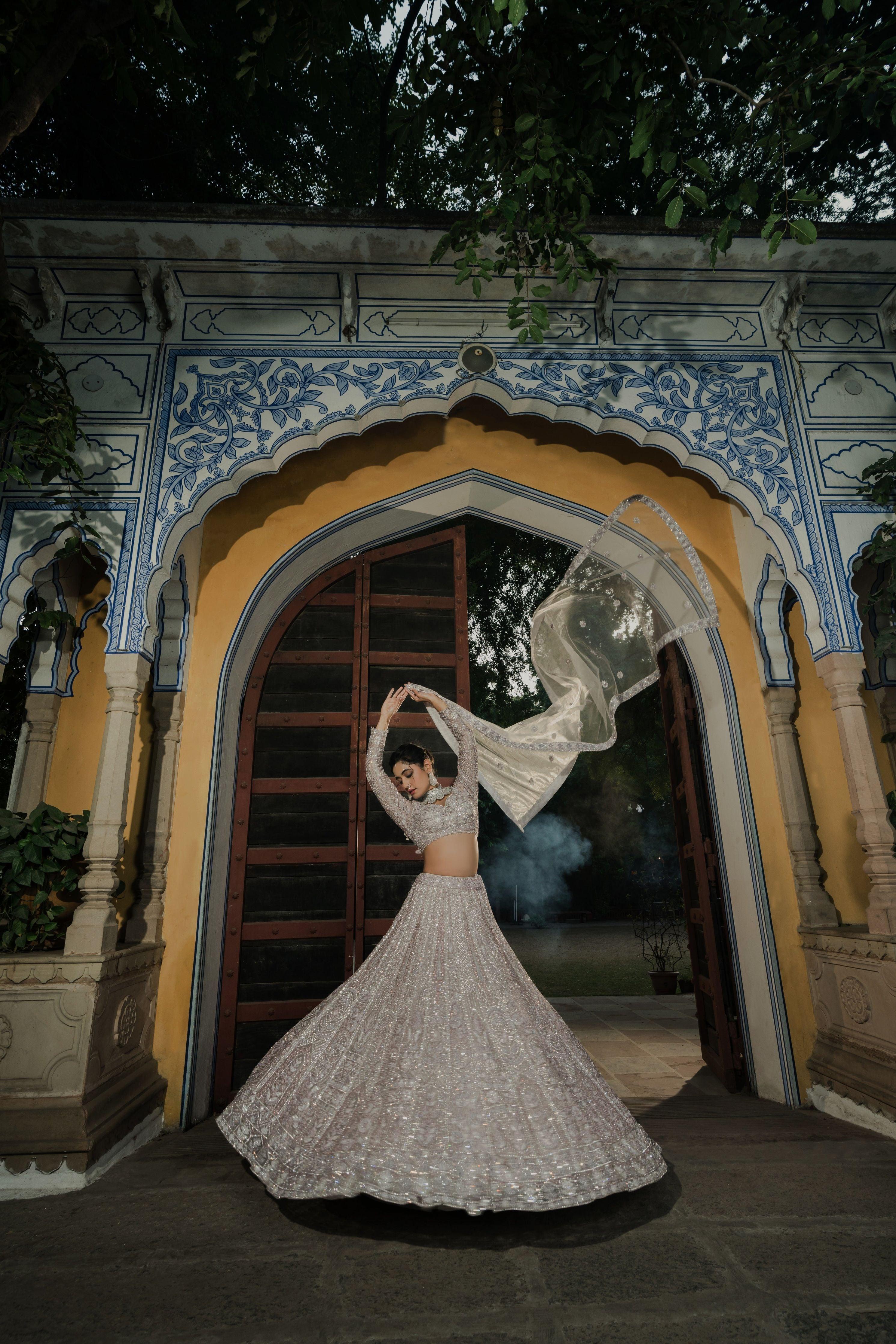 Pastel Grey Net Lehenga with Intricate Sequin Work  Mokshaa
