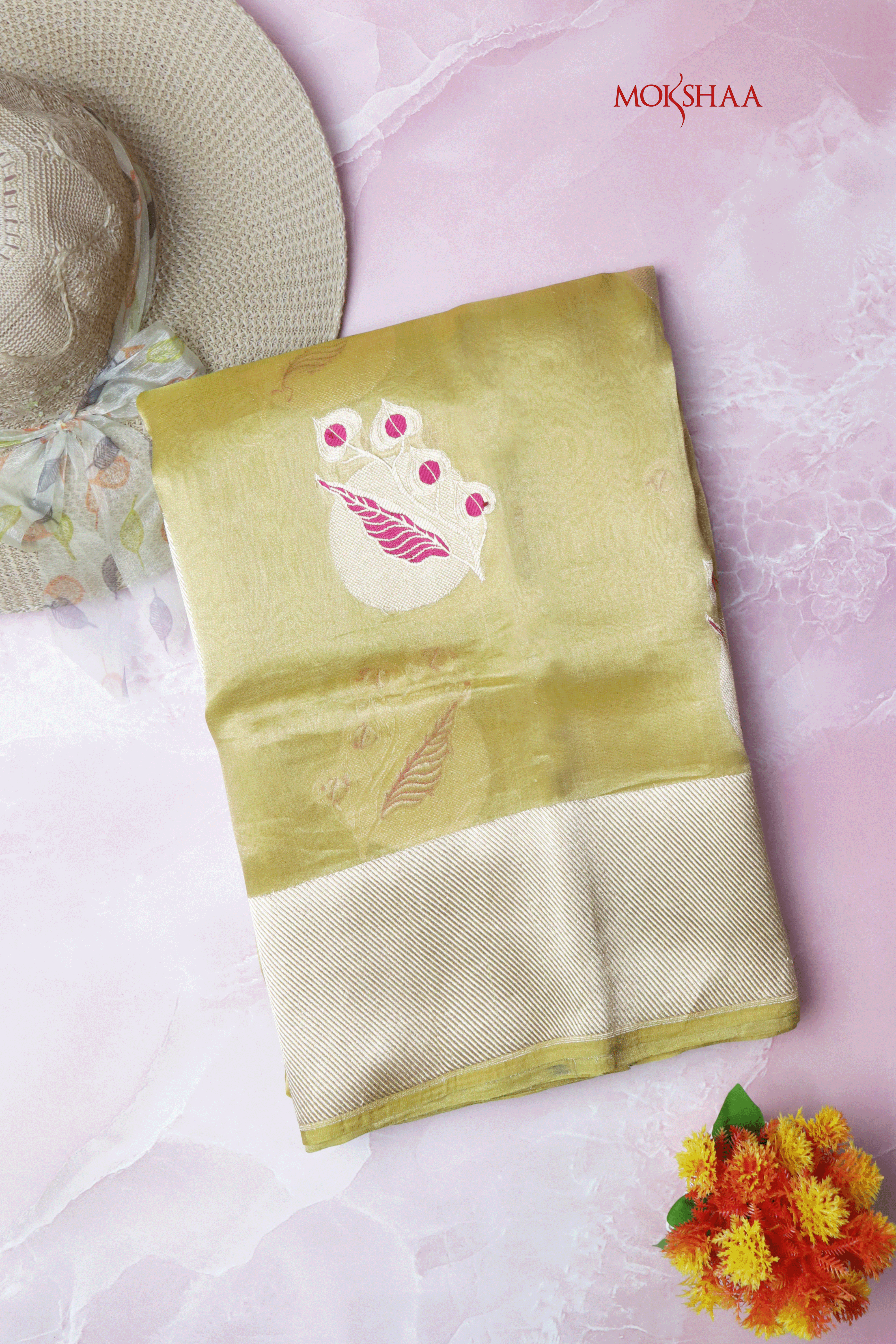 Olive Green Tissue Kora Saree with Cream Zari Border & Pink Leaf Motifs  Mokshaa
