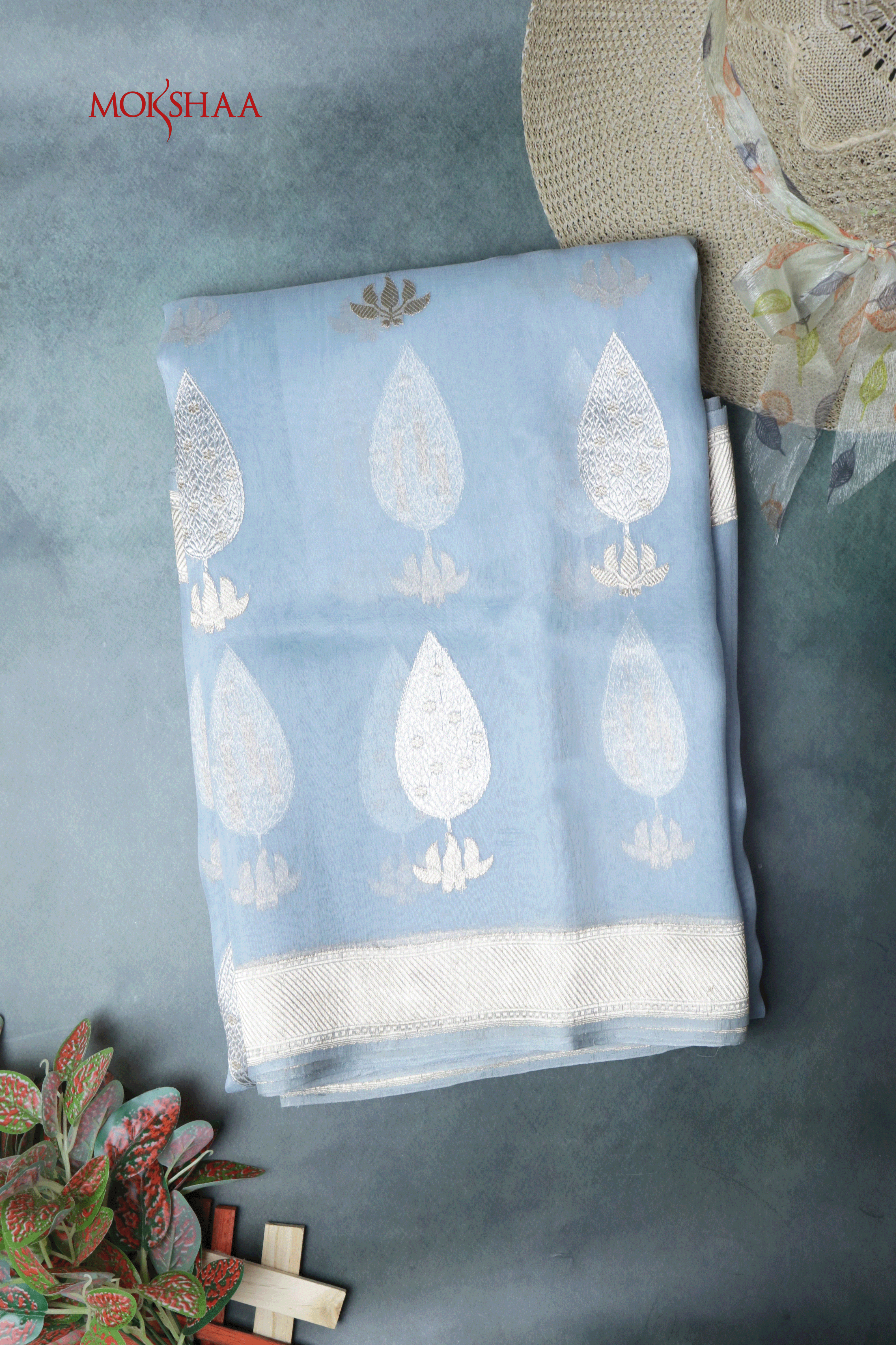 Sky Blue Tissue Organza Saree with Silver Motifs  Mokshaa