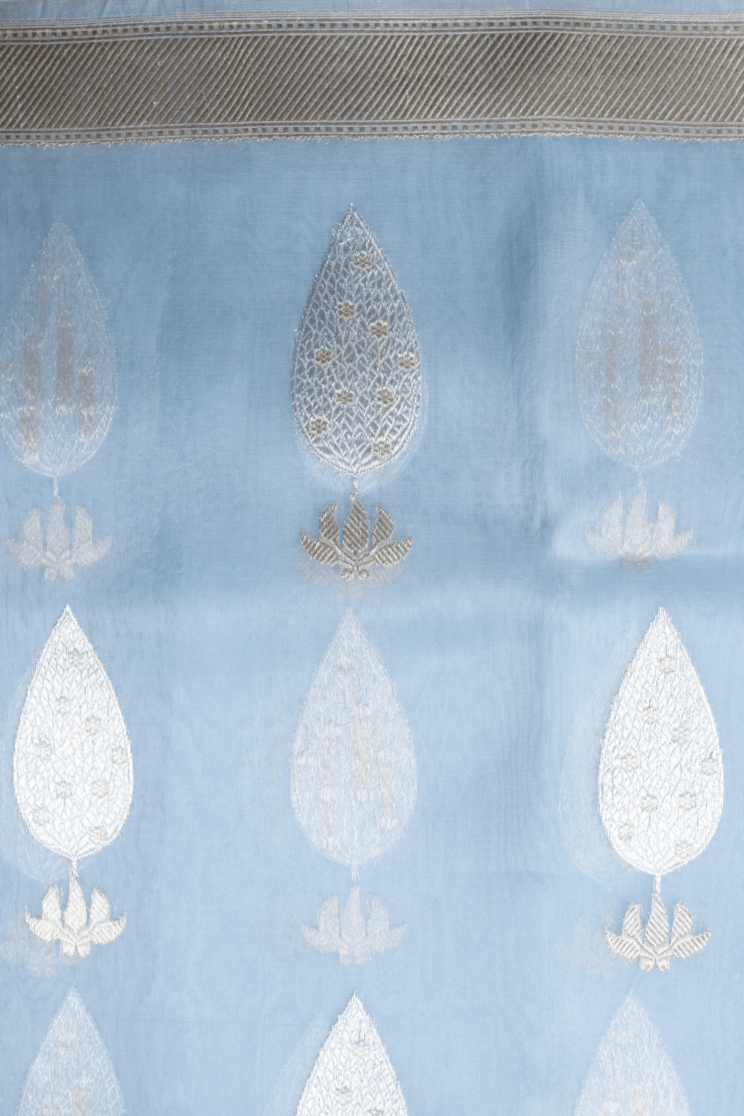 Sky Blue Tissue Organza Saree with Silver Motifs  Mokshaa