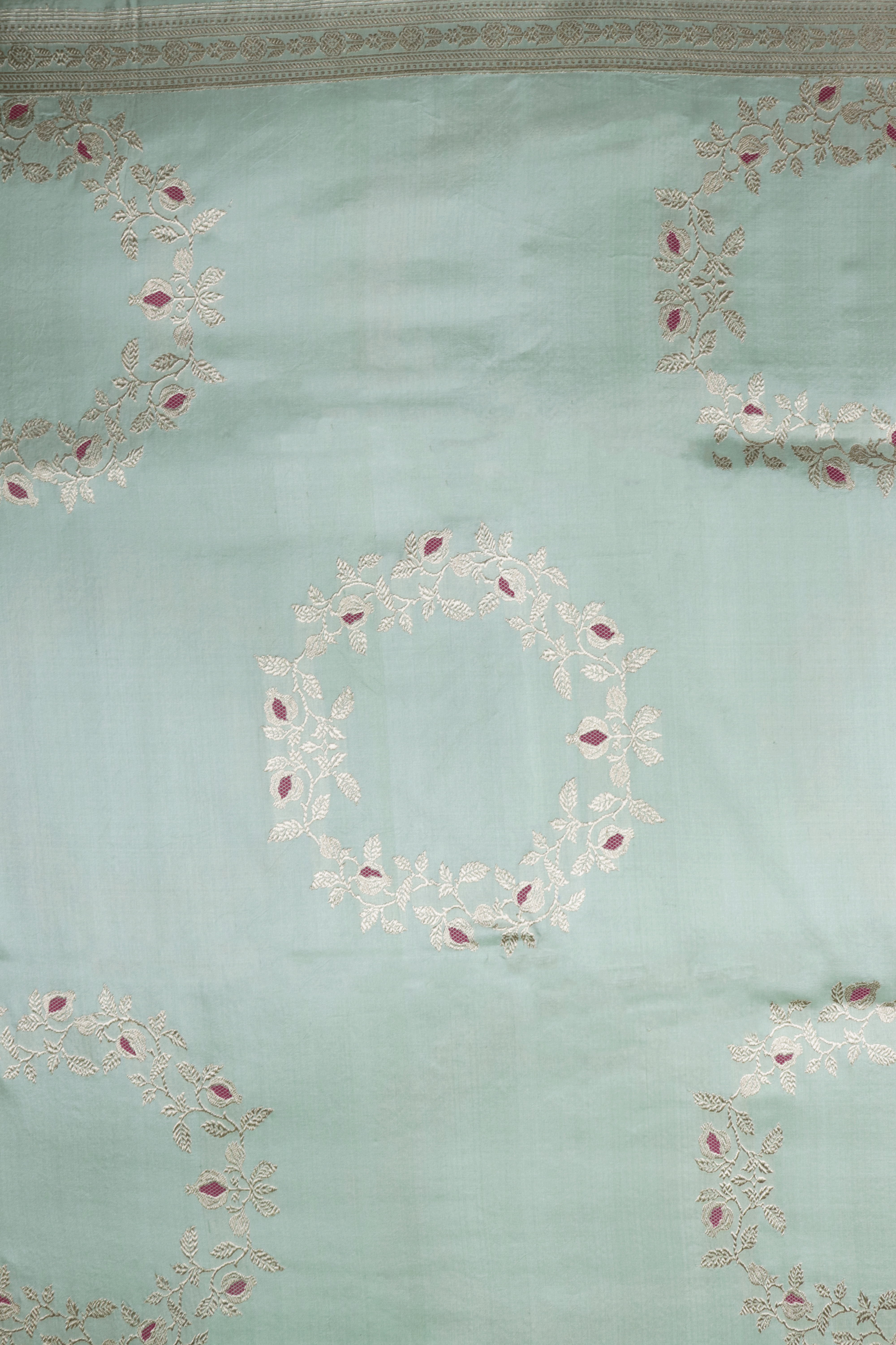 Mint Green Banarasi Silk Saree with Antique Zari Medallions  Mokshaa