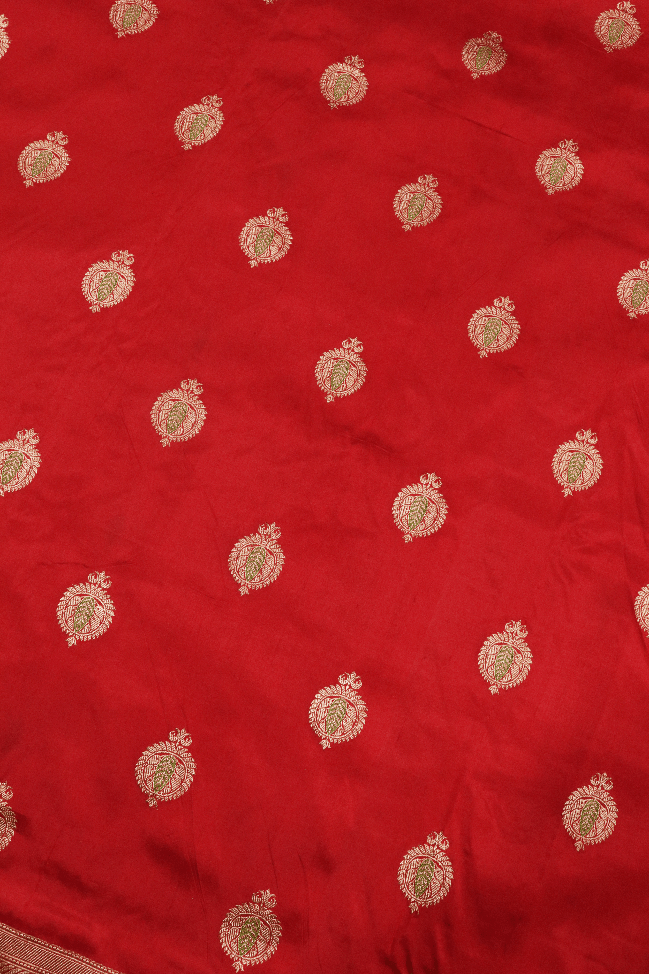 Red Banarasi Silk Saree with Kaduwa Buttas & Sequin Border.