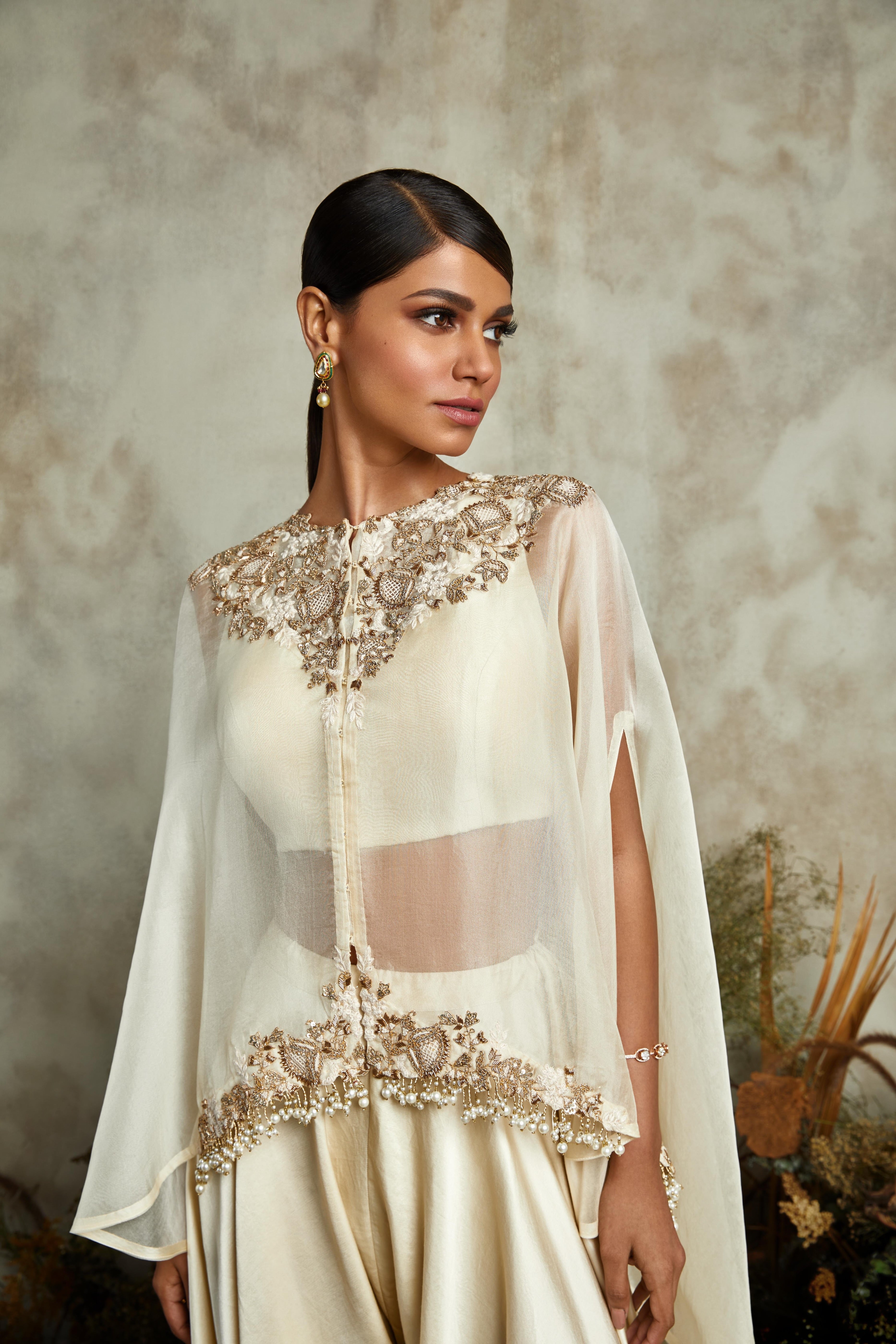 Ivory organza umbrella cape with silk bustier and cotton satin pants  Mokshaa