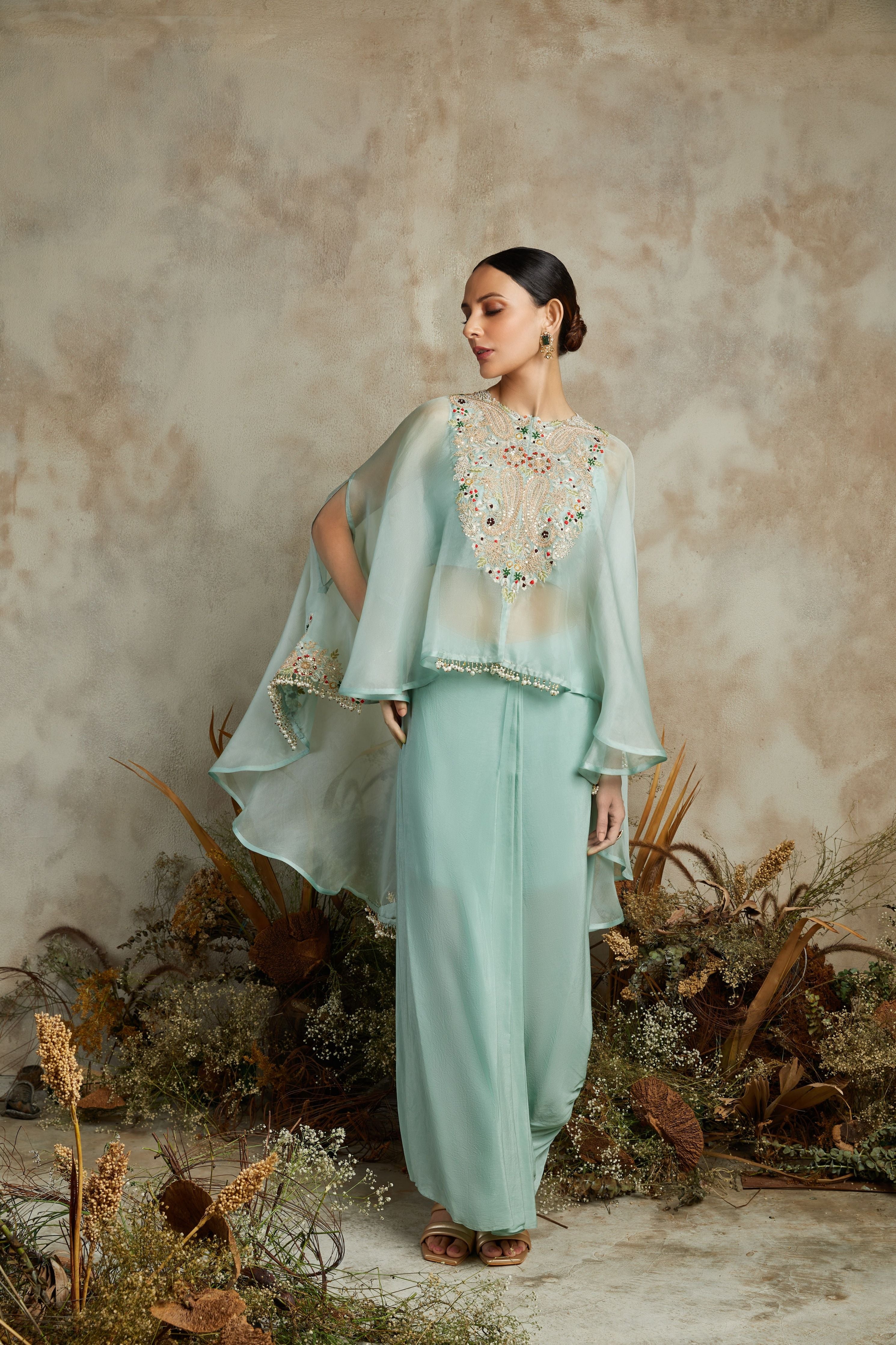 Aqua organza umbrella cape with silk bustier and crepe pants  Mokshaa