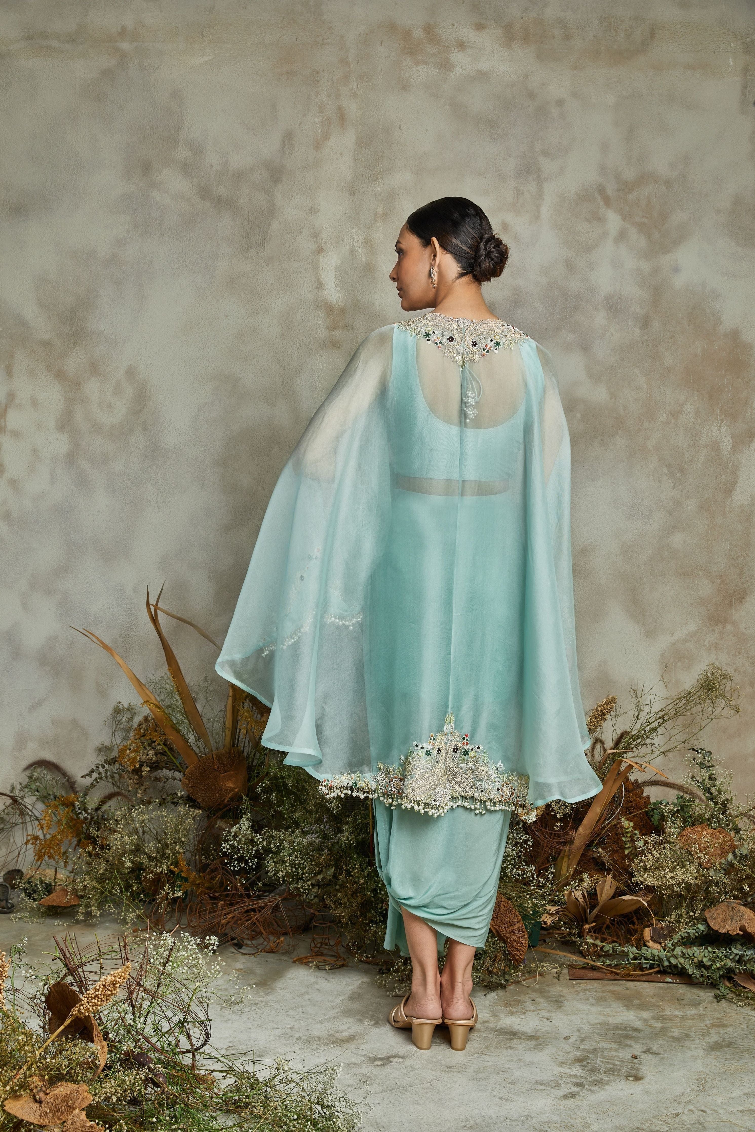 Aqua organza umbrella cape with silk bustier and crepe pants  Mokshaa