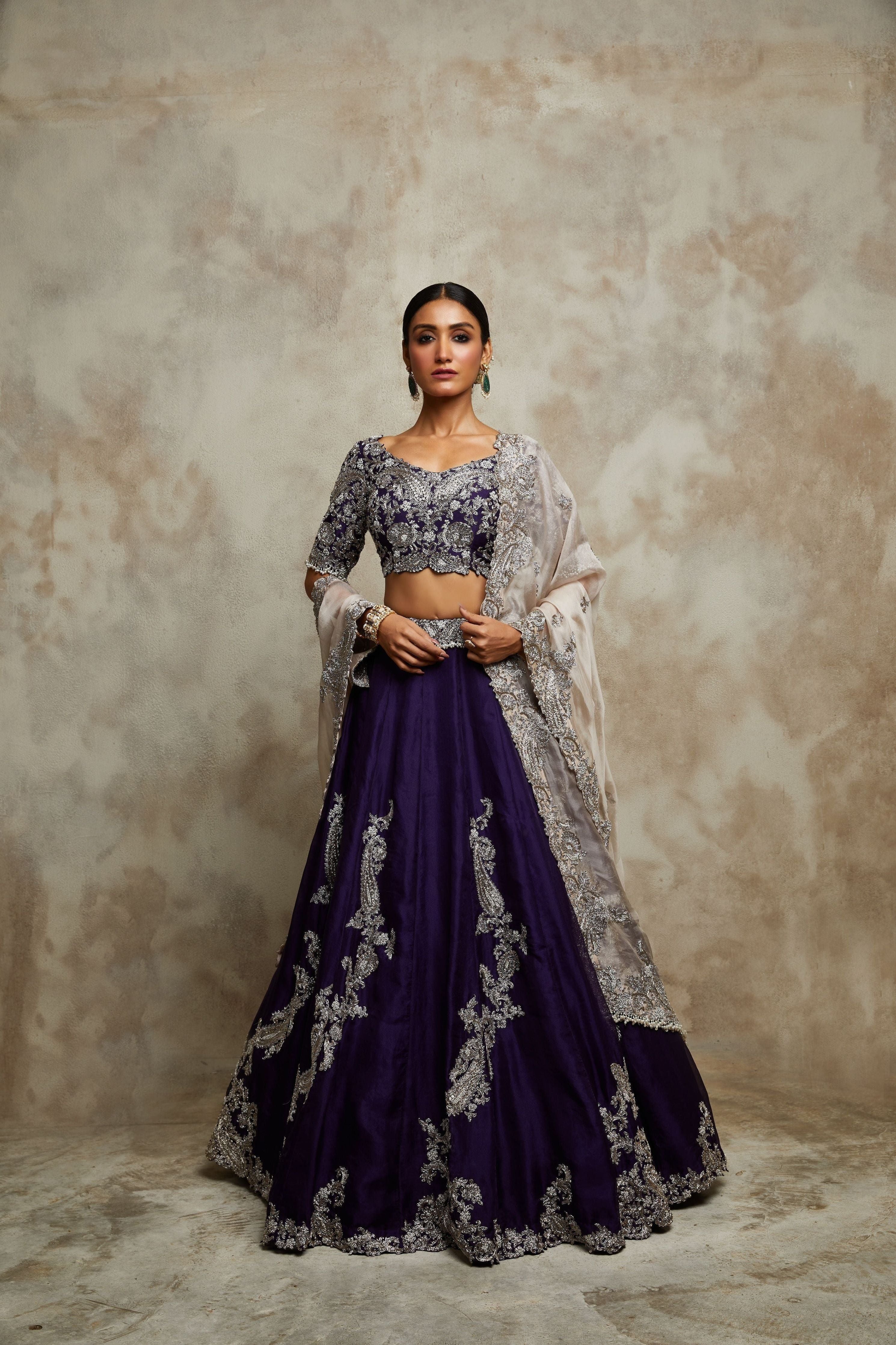 Dark aubergine silk blouse with organza lehenga and champagne organza dupatta  Mokshaa
