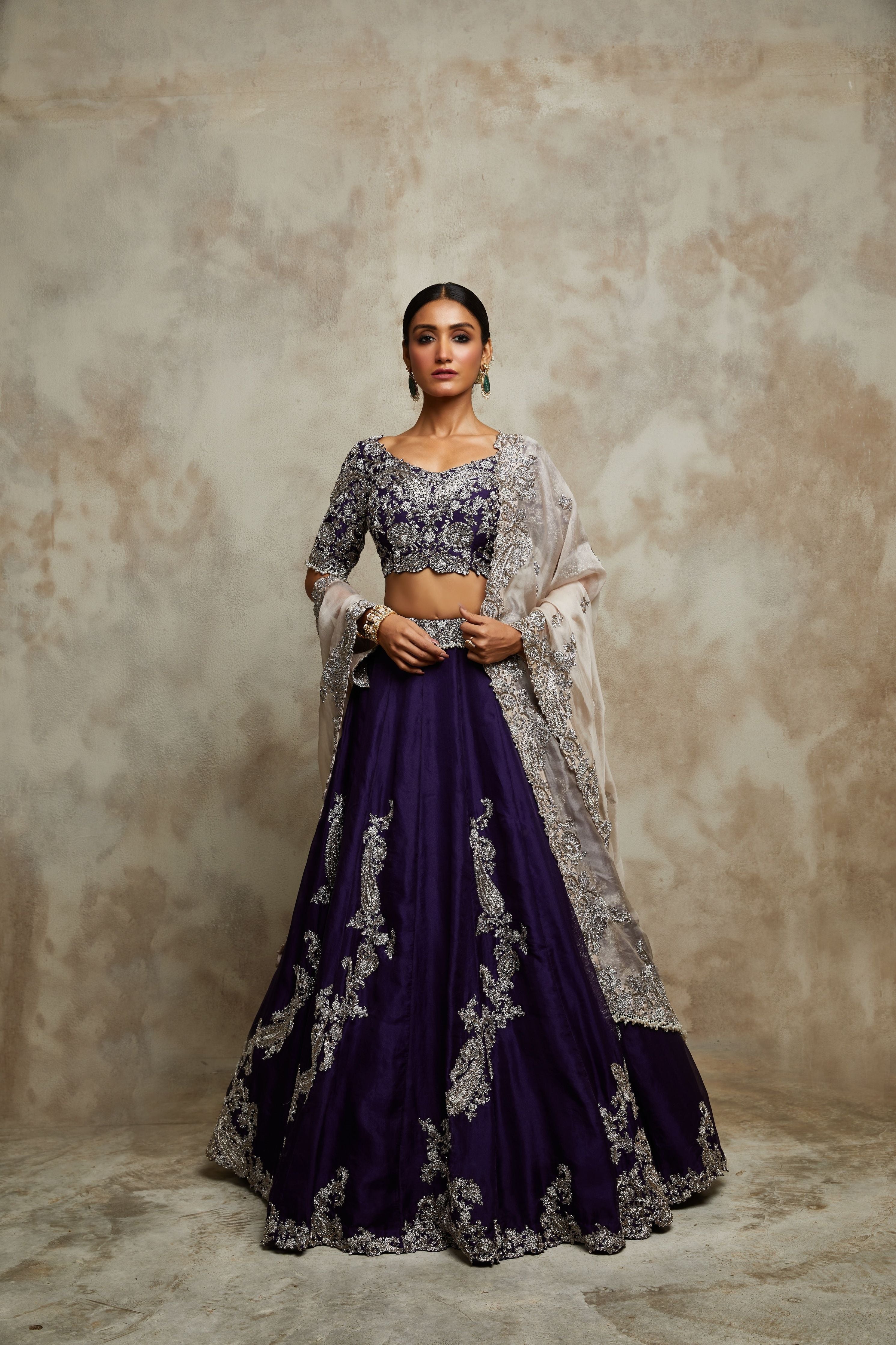 Dark aubergine silk blouse with organza lehenga and champagne organza dupatta  Mokshaa