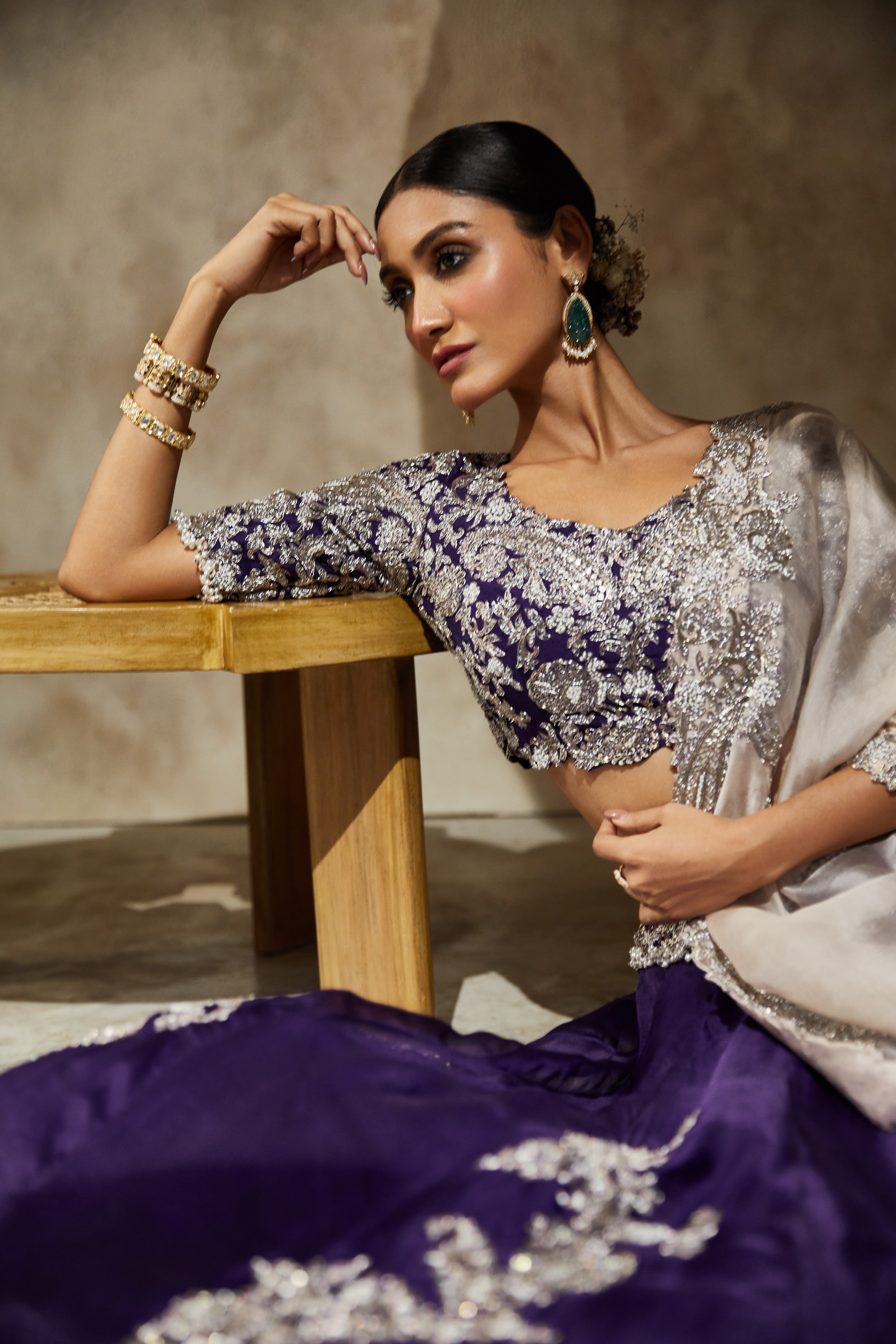 Dark aubergine silk blouse with organza lehenga and champagne organza dupatta  Mokshaa