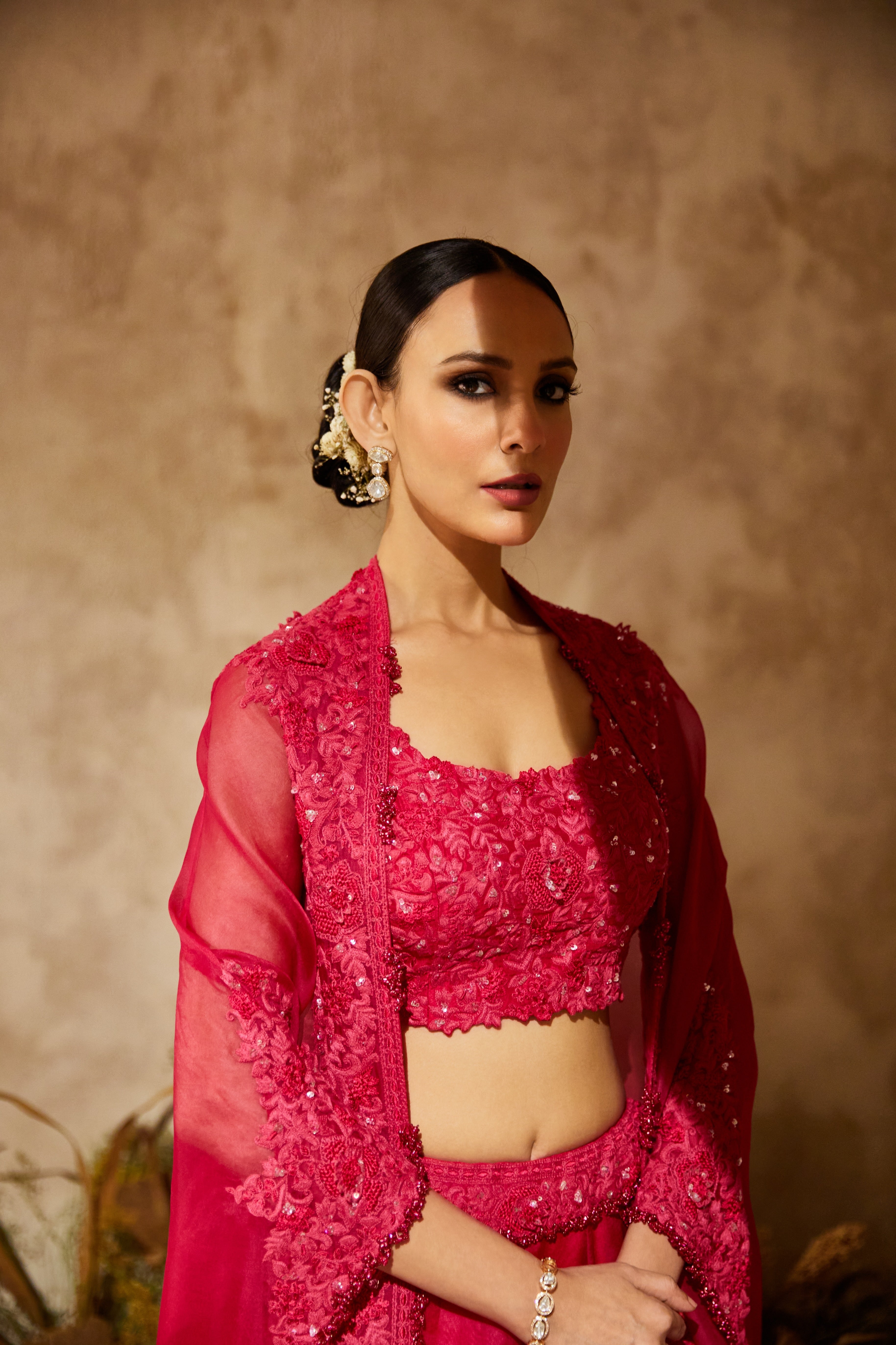 Fuscia silk blouse with organza cape and lehenga  Mokshaa