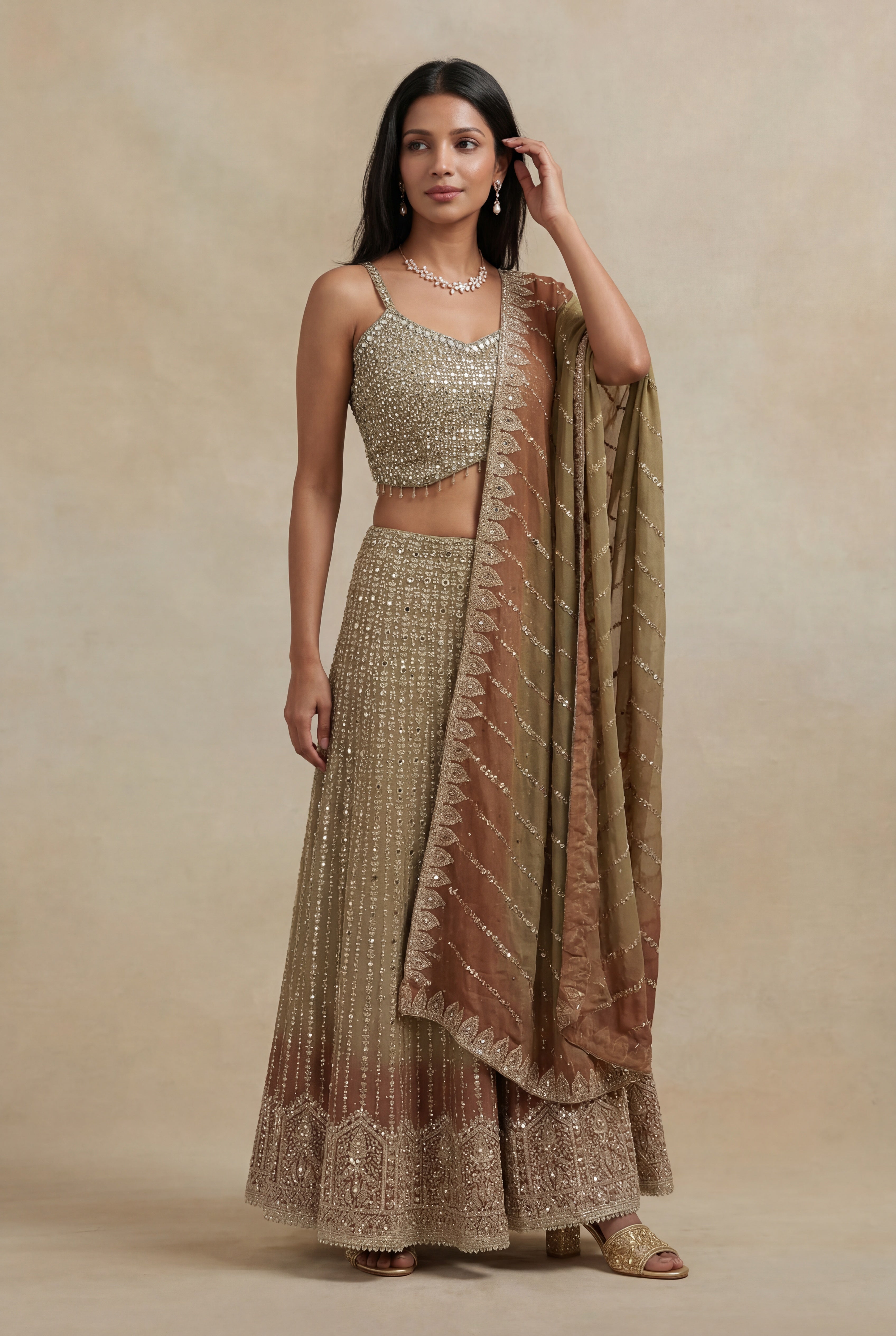 Gold Georgette Lehenga with Stone & Mirror Work and Embroidered Dupatta