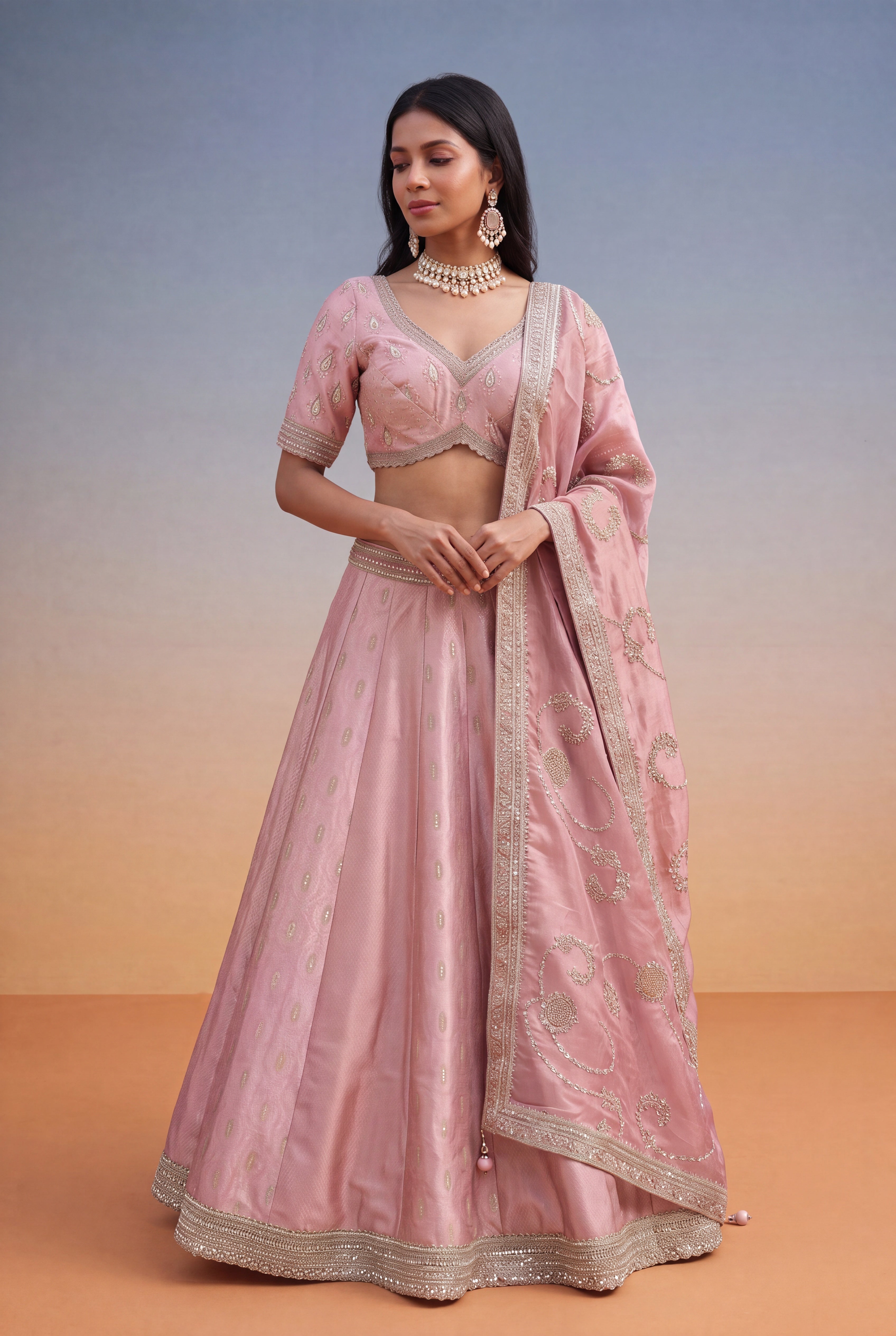Dusty Pink Banarasi Silk Lehenga with Kutdana & Pearl Embroidery