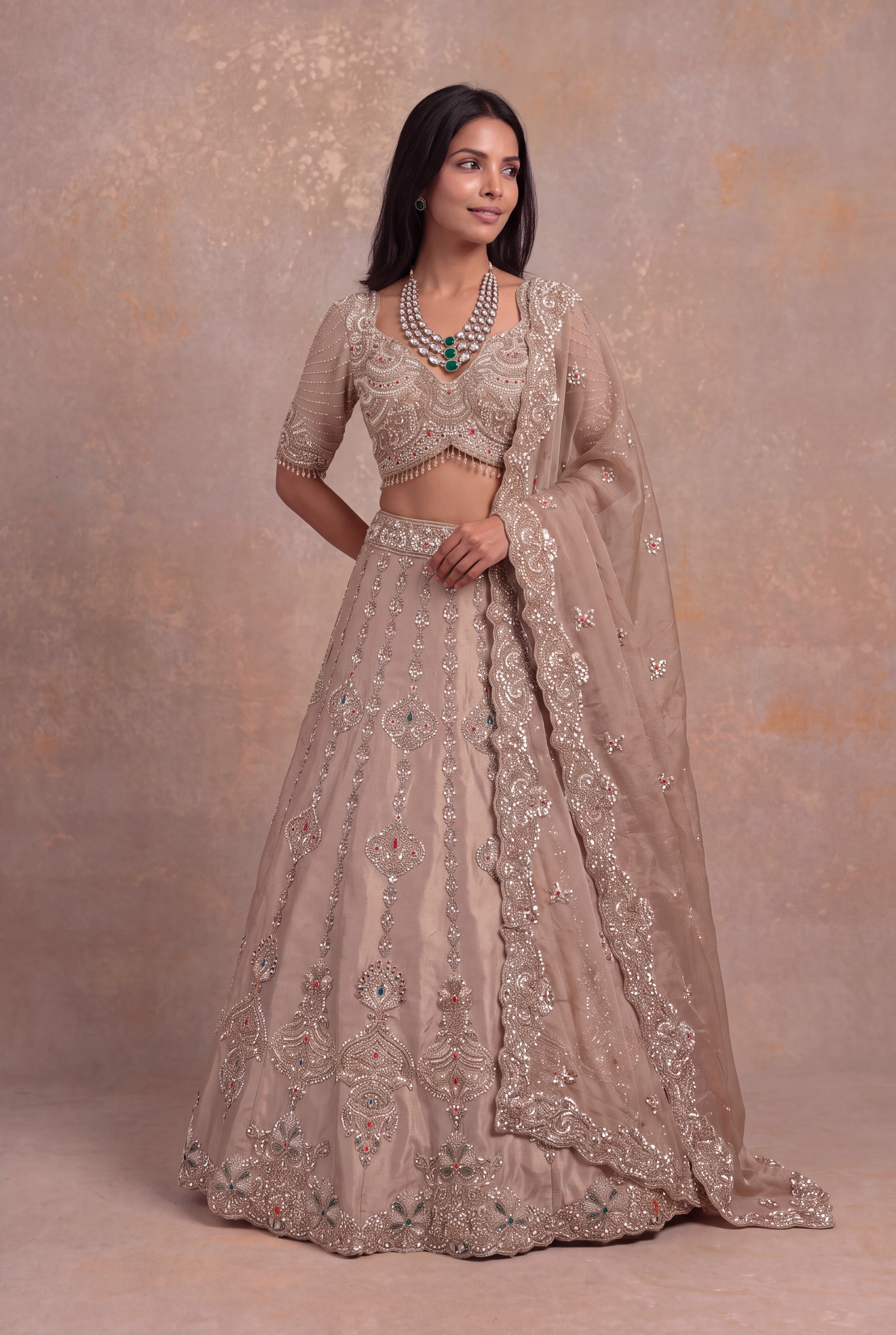Golden Tissue Lehenga with Multicolour Kundan & Sequin Embroidery