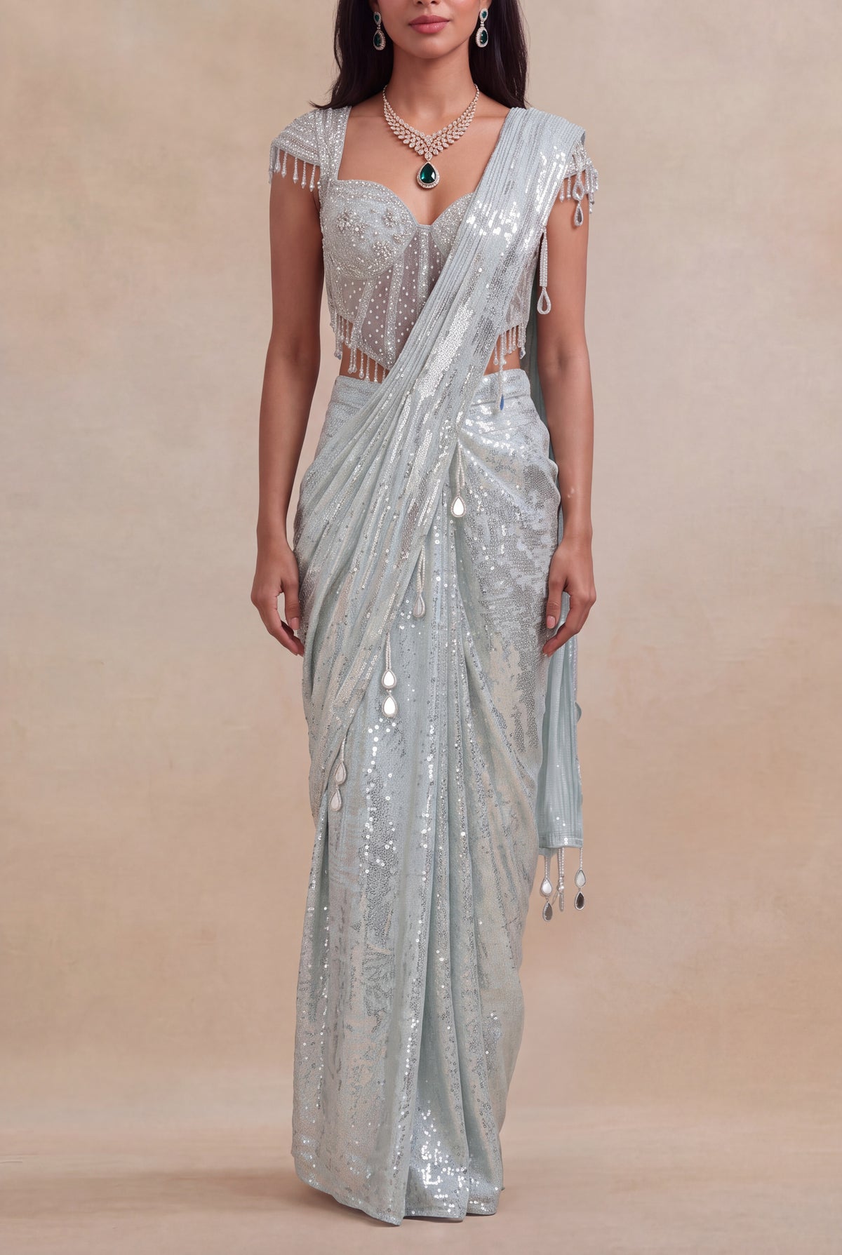 Ice Blue Net Drape Saree with Embellished Corset Blouse