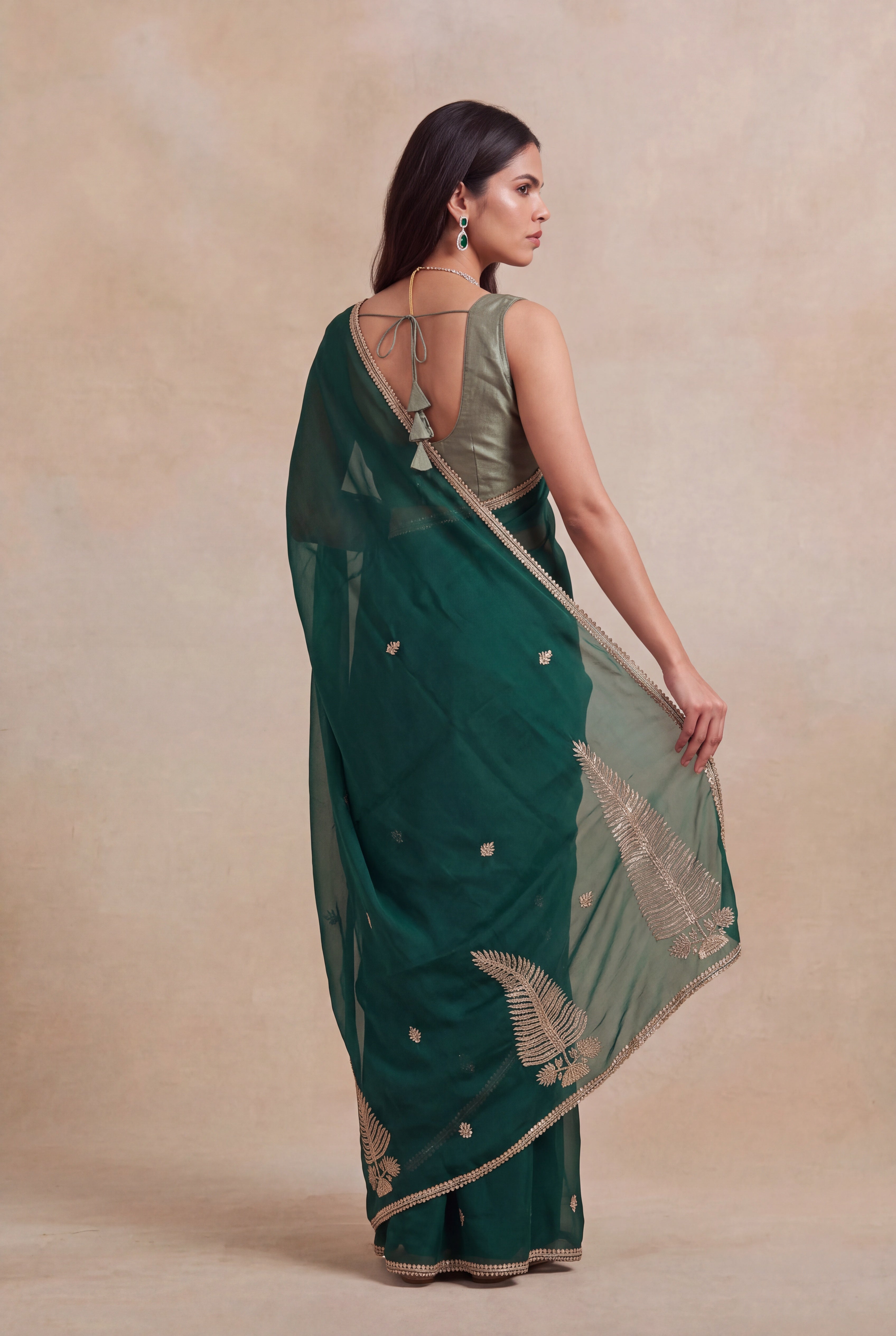 Emerald Green Organza Saree with Gold Sequin Work