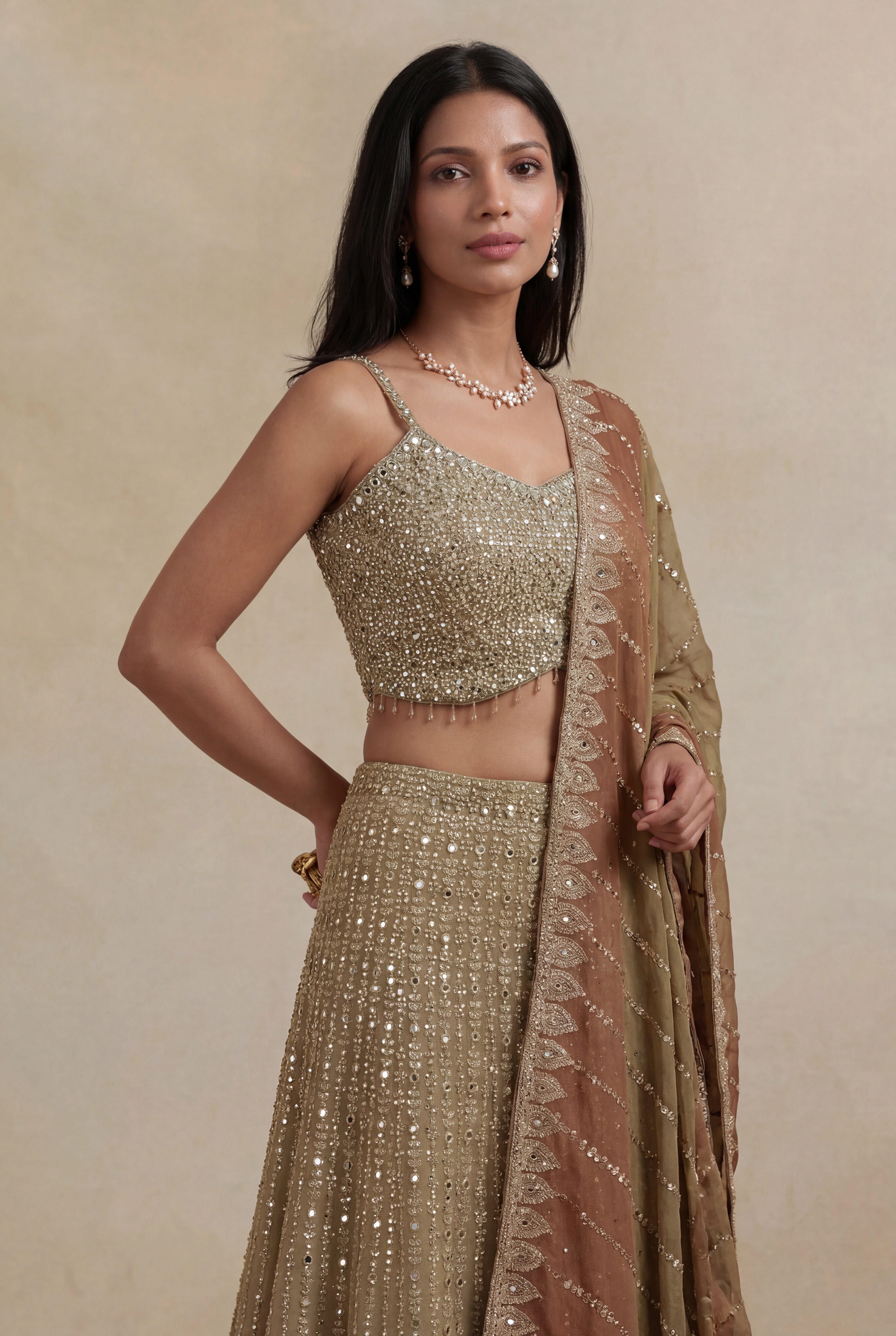 Gold Georgette Lehenga with Stone & Mirror Work and Embroidered Dupatta