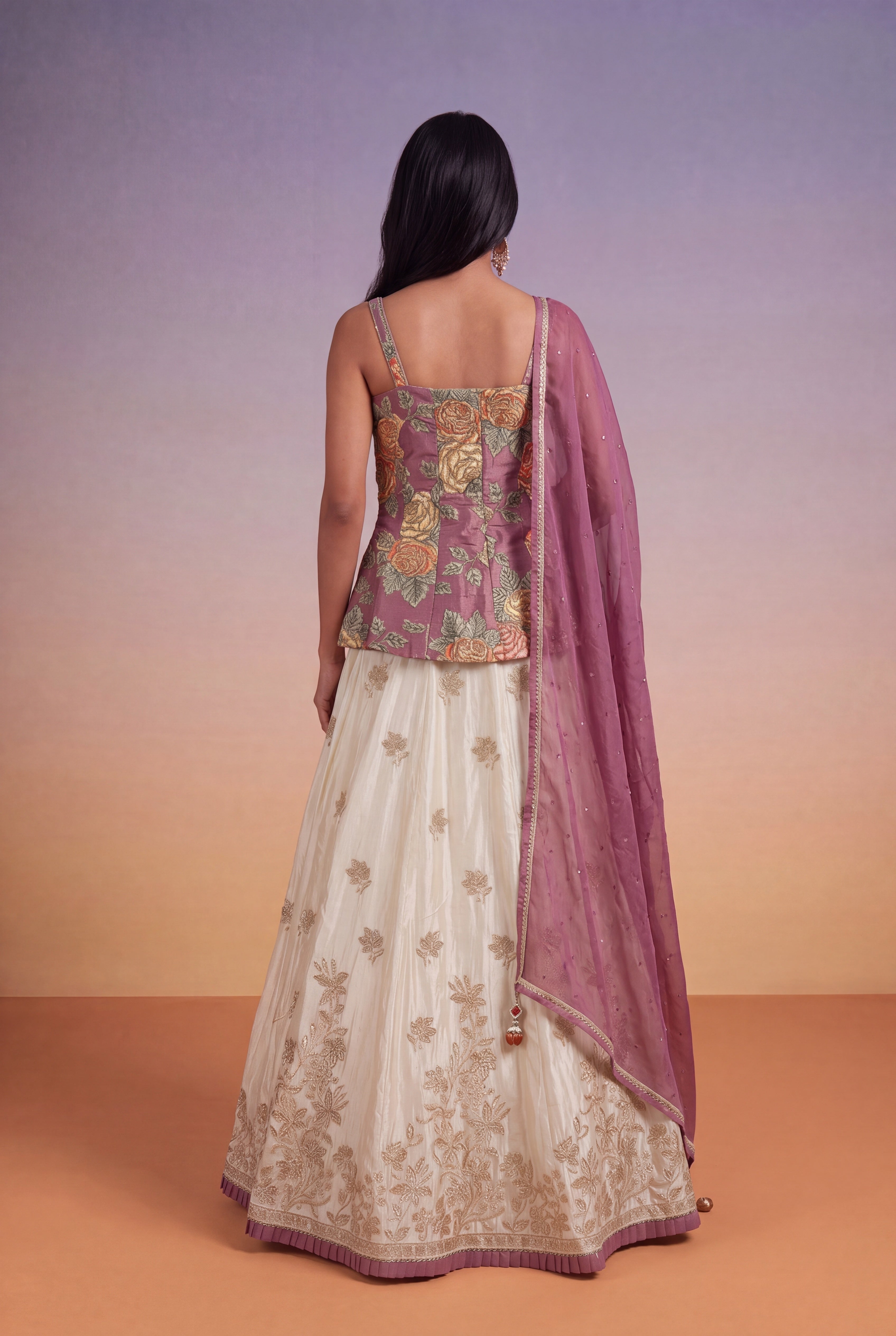 Mauve Floral Corset Peplum with Ivory Tissue Lehenga Skirt
