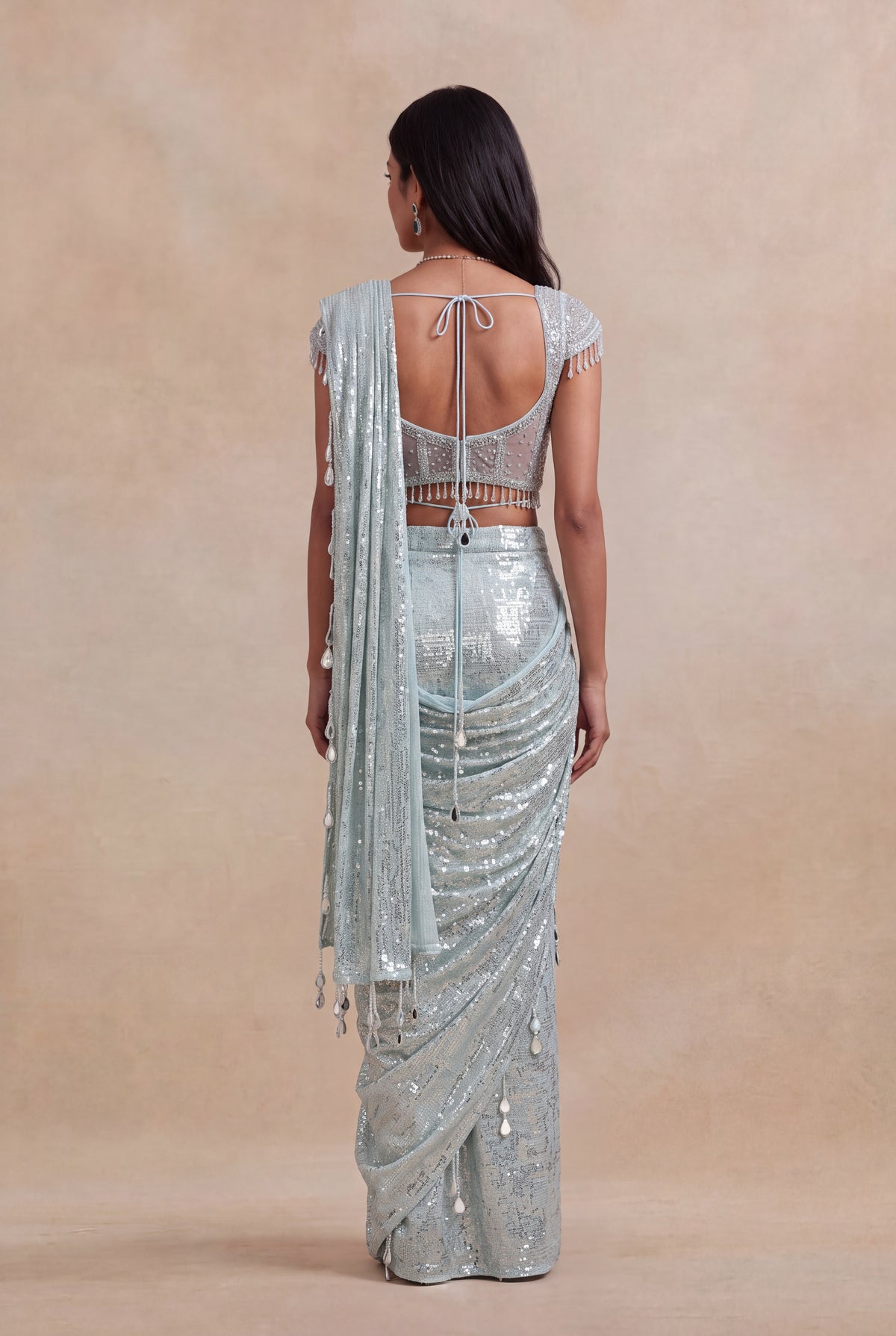 Ice Blue Net Drape Saree with Embellished Corset Blouse