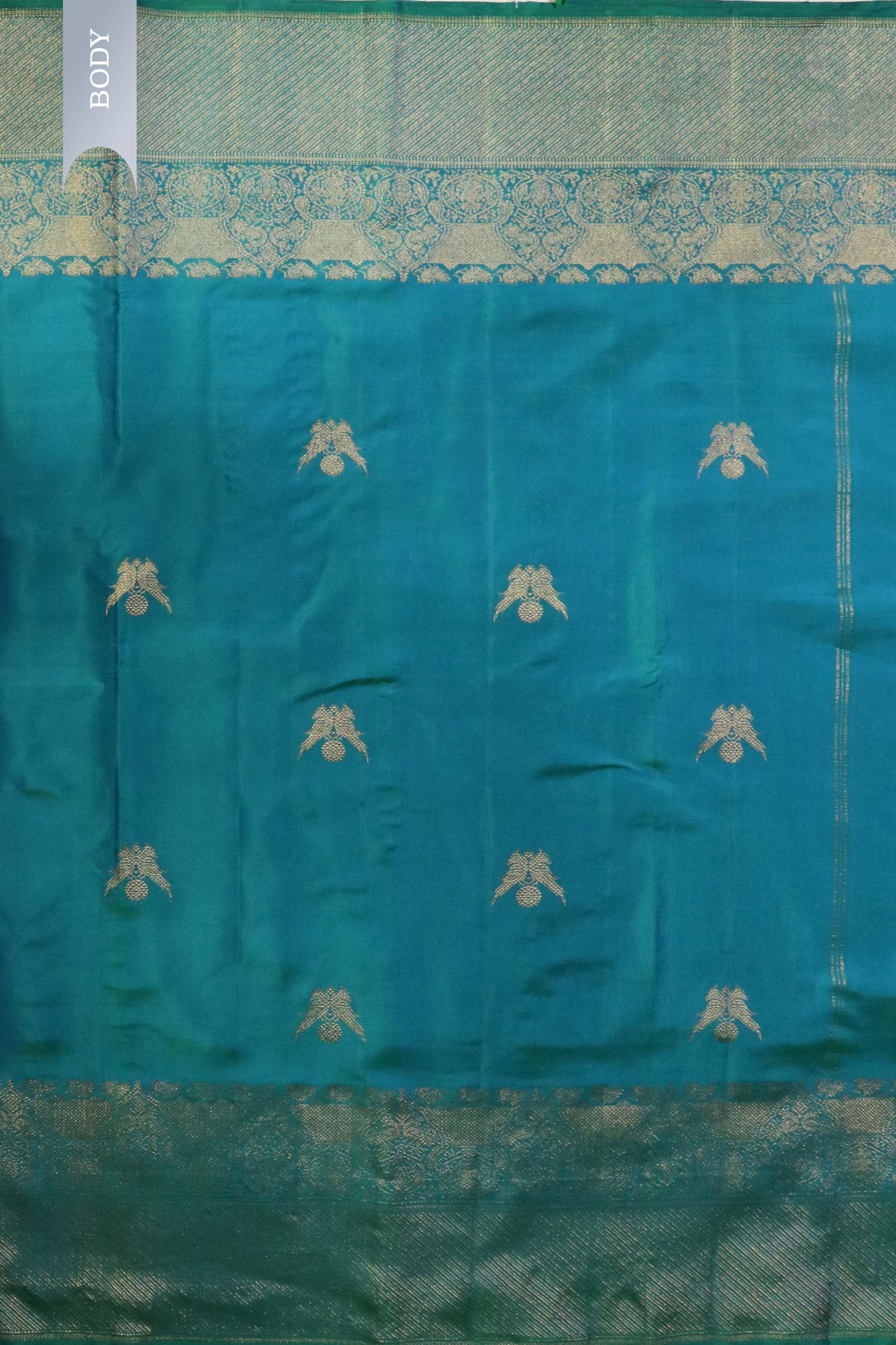 Turquoise Blue Kanchivaram Silk Saree with Fancy Zari Butta - Mokshaa