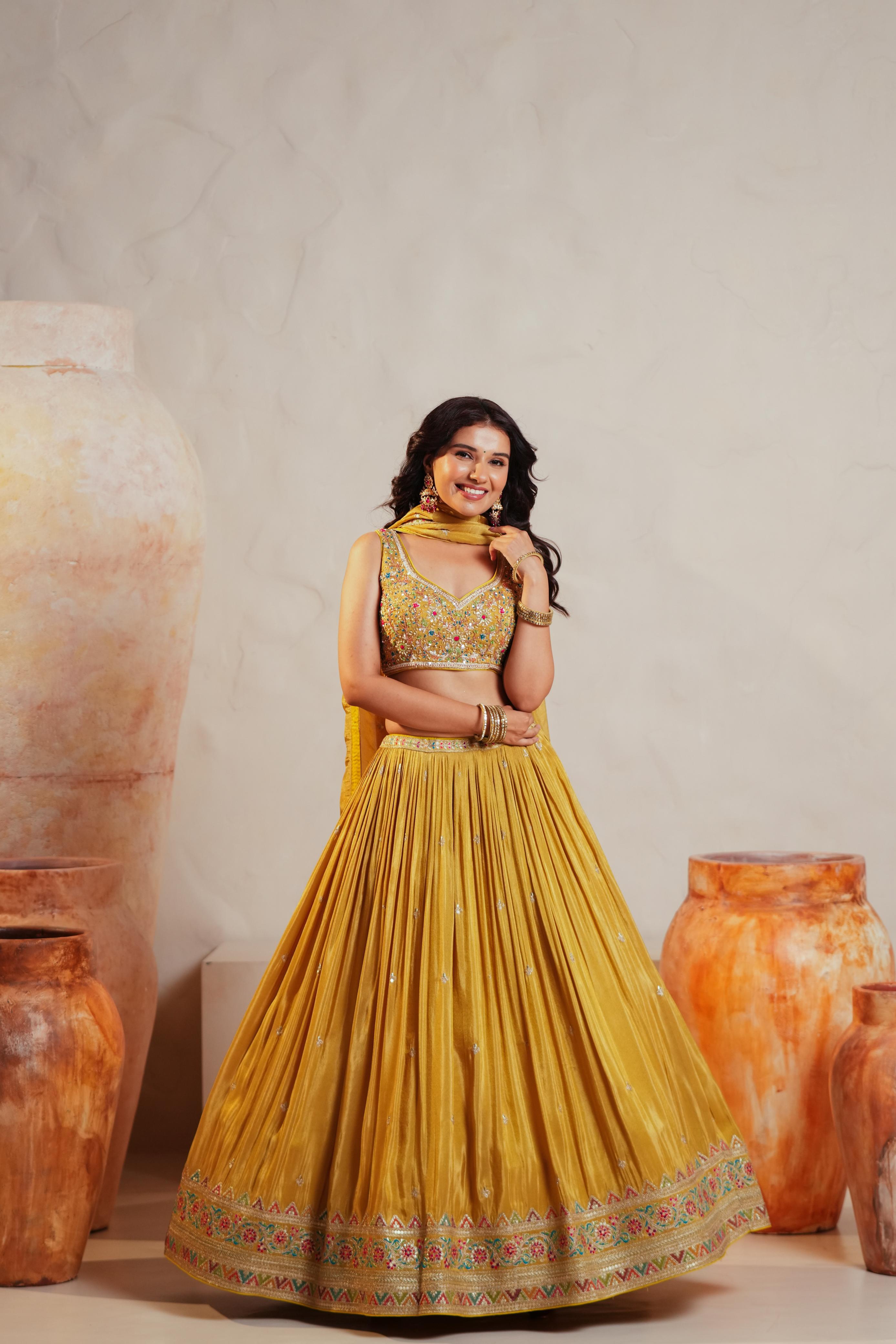 Mustard Yellow Tissue Lehenga with Multicolor Embroidery