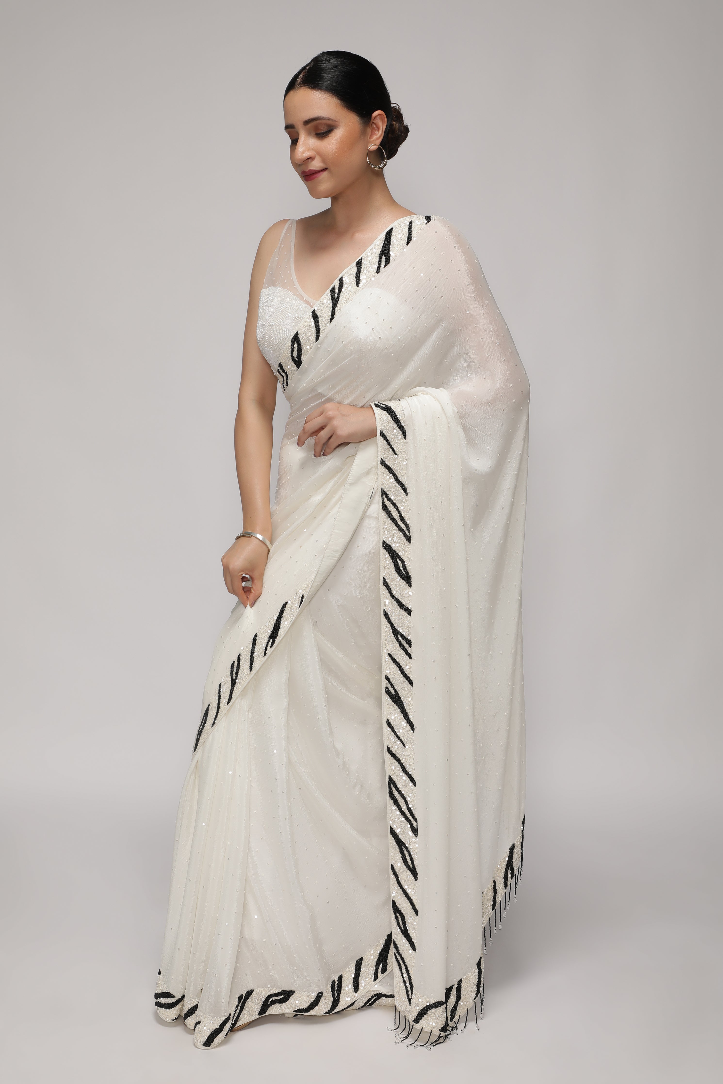 White Crepe Chiffon Saree with Sequins and Beaded Border